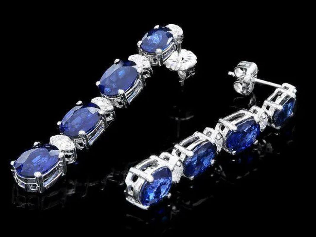 7.30Ct Natural Sapphire and Diamond 14K White Gold Earrings

Total Natural Oval Cut Sapphires Weight: Approx. 7.00 Carats

Sapphires Treatment: Diffusion

Sapphires Measure: Approx. 6 x 4 / 8 x 6 mm

Total Natural Round Cut White Diamonds Weight: