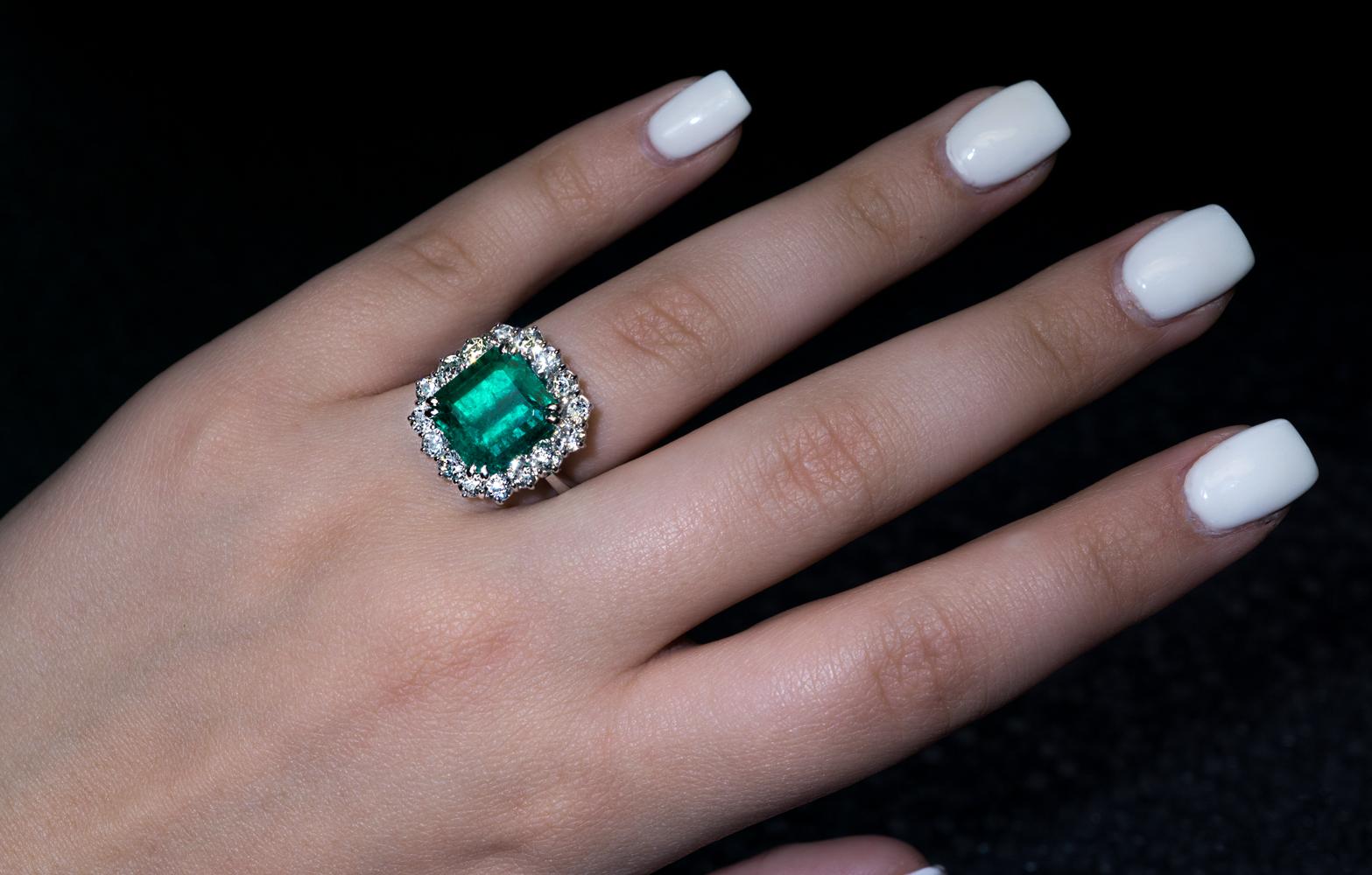 This vintage 18K white gold engagement ring was made in Vienna, Austria in the 1950s. The ring features a 7.31 ct emerald cut Colombian emerald framed by bright white old European and transitional cut diamonds (G-H color, VS2 – SI2 clarity).

The