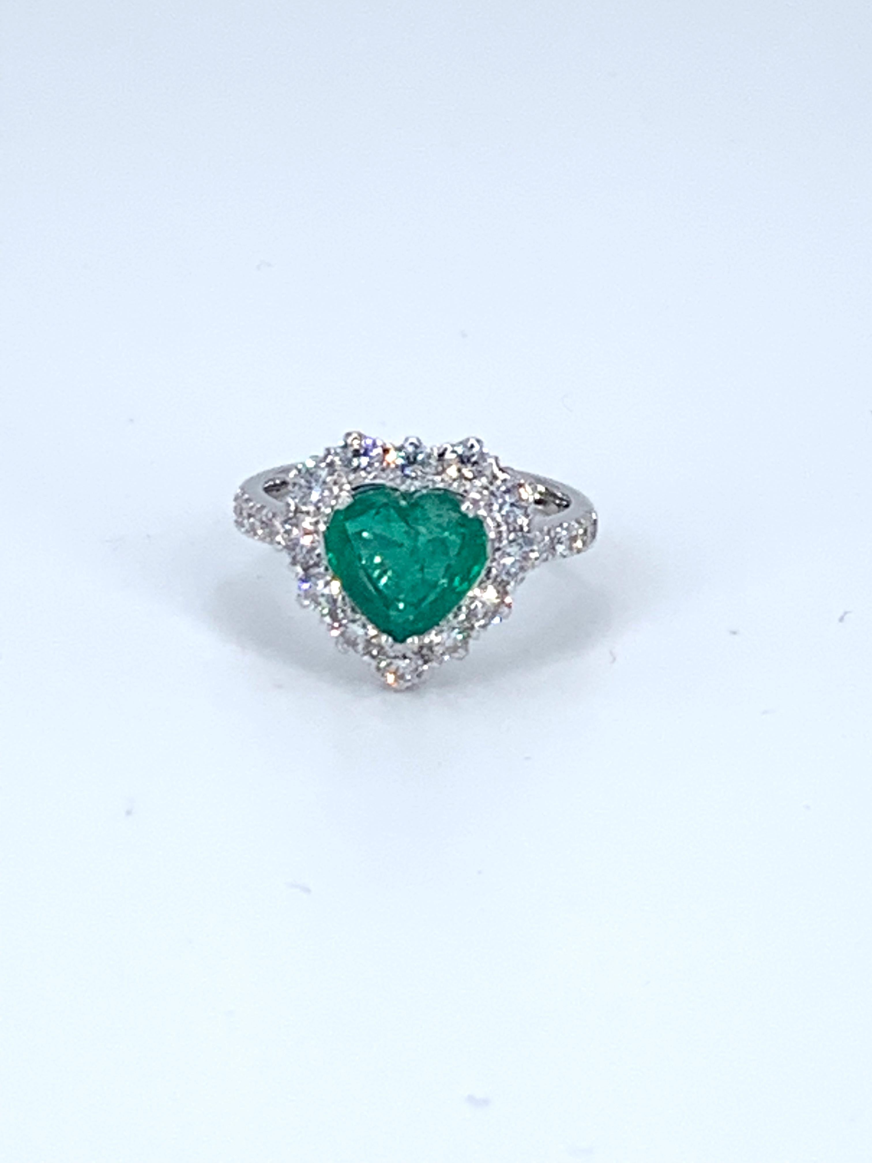 This romantic and stunning 7.32 Carat Emerald heart ring is surrounded by 3.75 Carats of natural white Diamonds. 

Set in 18Kt white Gold, the Diamond can be gifted as a unique engagement ring, or purely an exquisite cocktail ring. 

The perfect