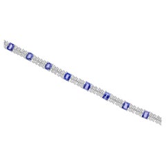 Zafiro azul brillante de 7,32 quilates y pulsera de tenis con diamantes de 3,36 quilates, oro blanco de 18 quilates