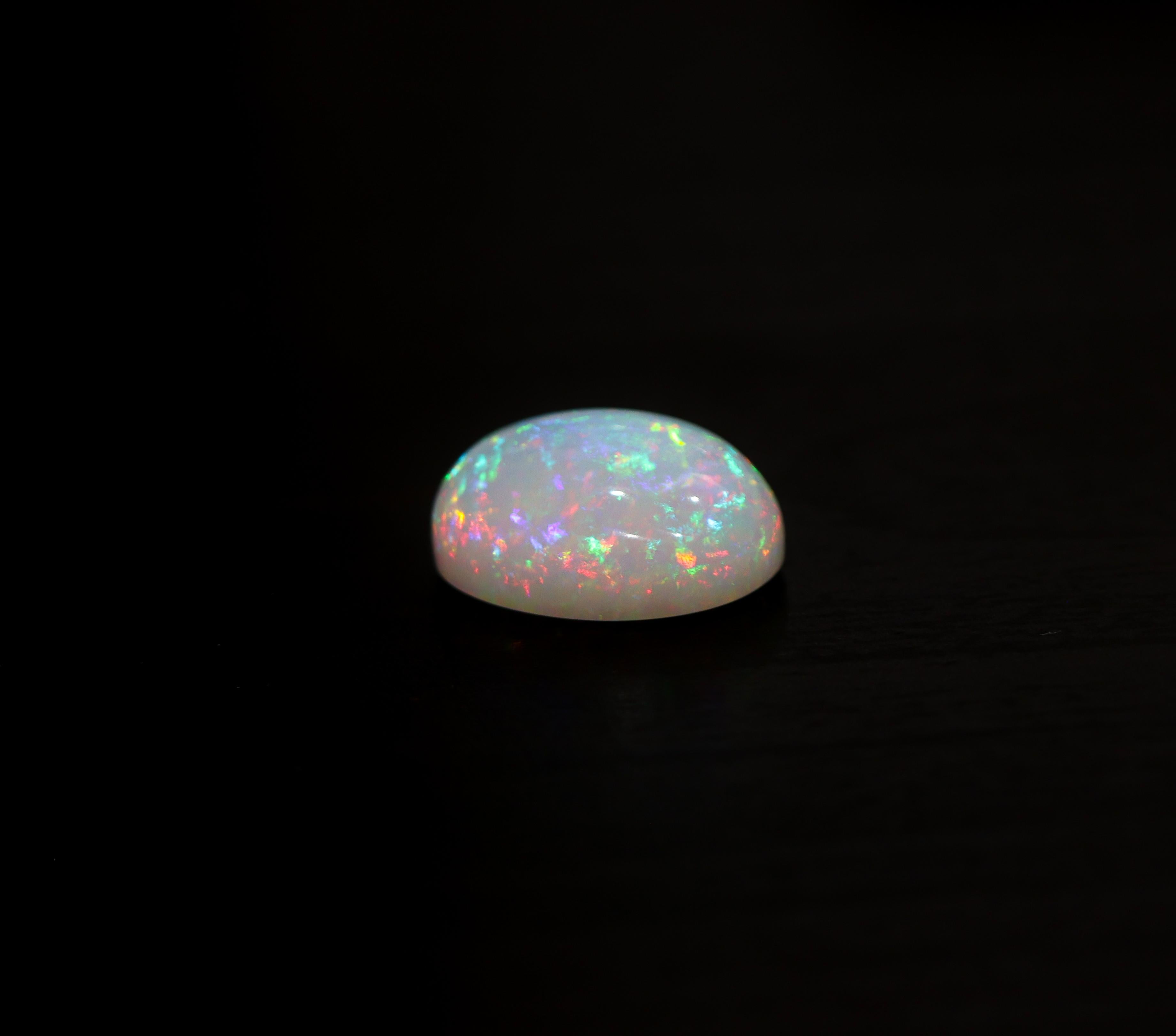 7.33 Carat Ethiopian Opal Gemstone  Oval 17x12.5mm  Loose Gemstone In New Condition For Sale In Columbus, OH