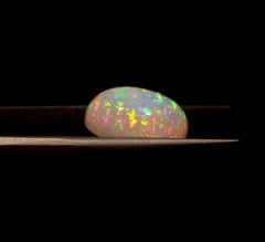 7.33 Carat Ethiopian Opal Gemstone  Oval 17x12.5mm  Loose Gemstone