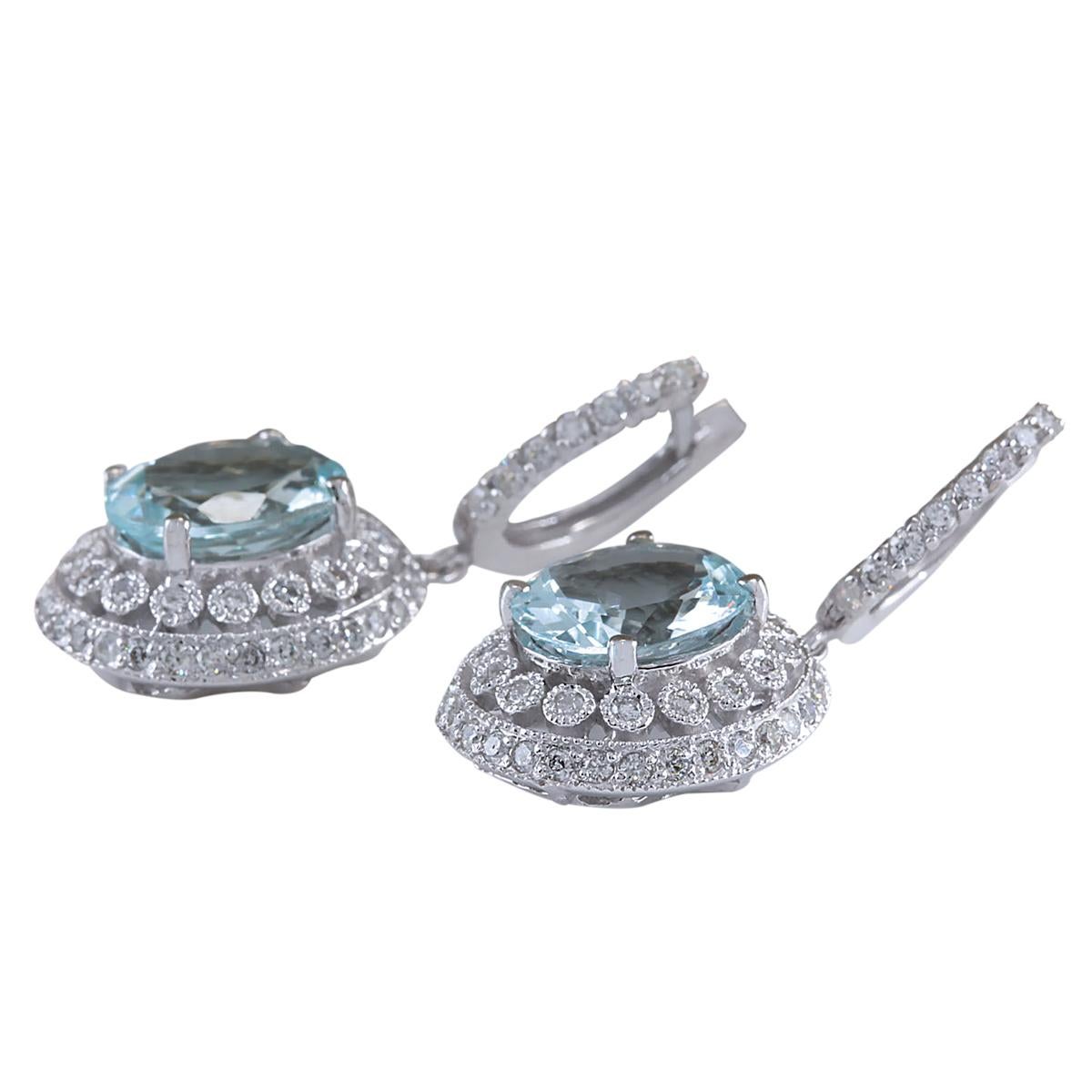 7.34 Carat Natural Aquamarine 14 Karat White Gold Diamond Earrings
Stamped: 14K 
White Gold
Total Earrings Weight: 8.9 Grams
Earrings Length: 1.30 Inches
Total Natural Aquamarine Weight is 5.34 Carat (Measures: 11.00x9.00 mm)
Color: Blue
Treatment:
