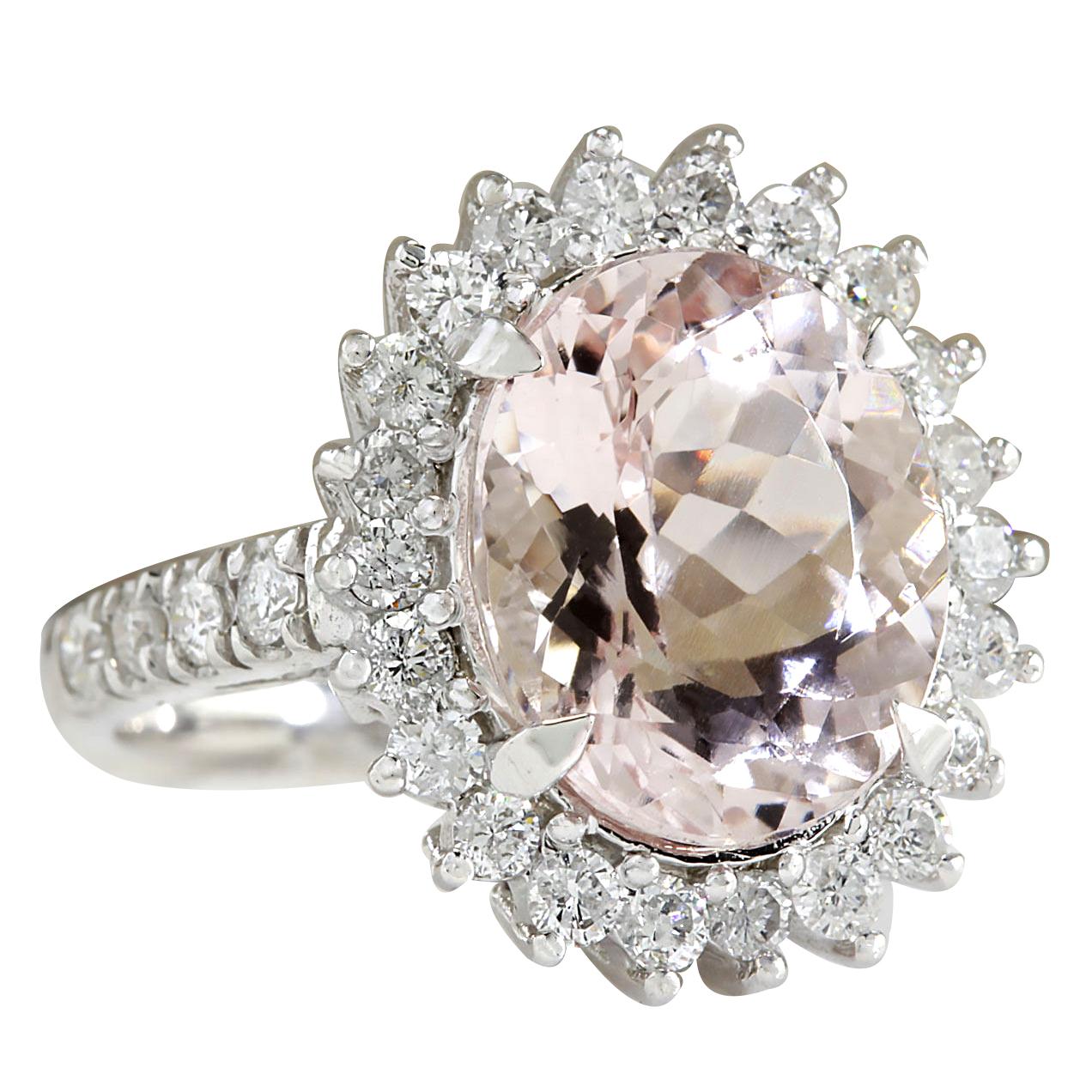 Stamped: 14K White Gold
Total Ring Weight: 6.9 Grams
Morganite Weight is 6.14 Carat (Measures: 14.00x10.00 mm)
Diamond Weight is 1.20 Carat
Color: F-G, Clarity: VS2-SI1
Face Measures: 19.45x17.00 mm
Sku: [702505W]