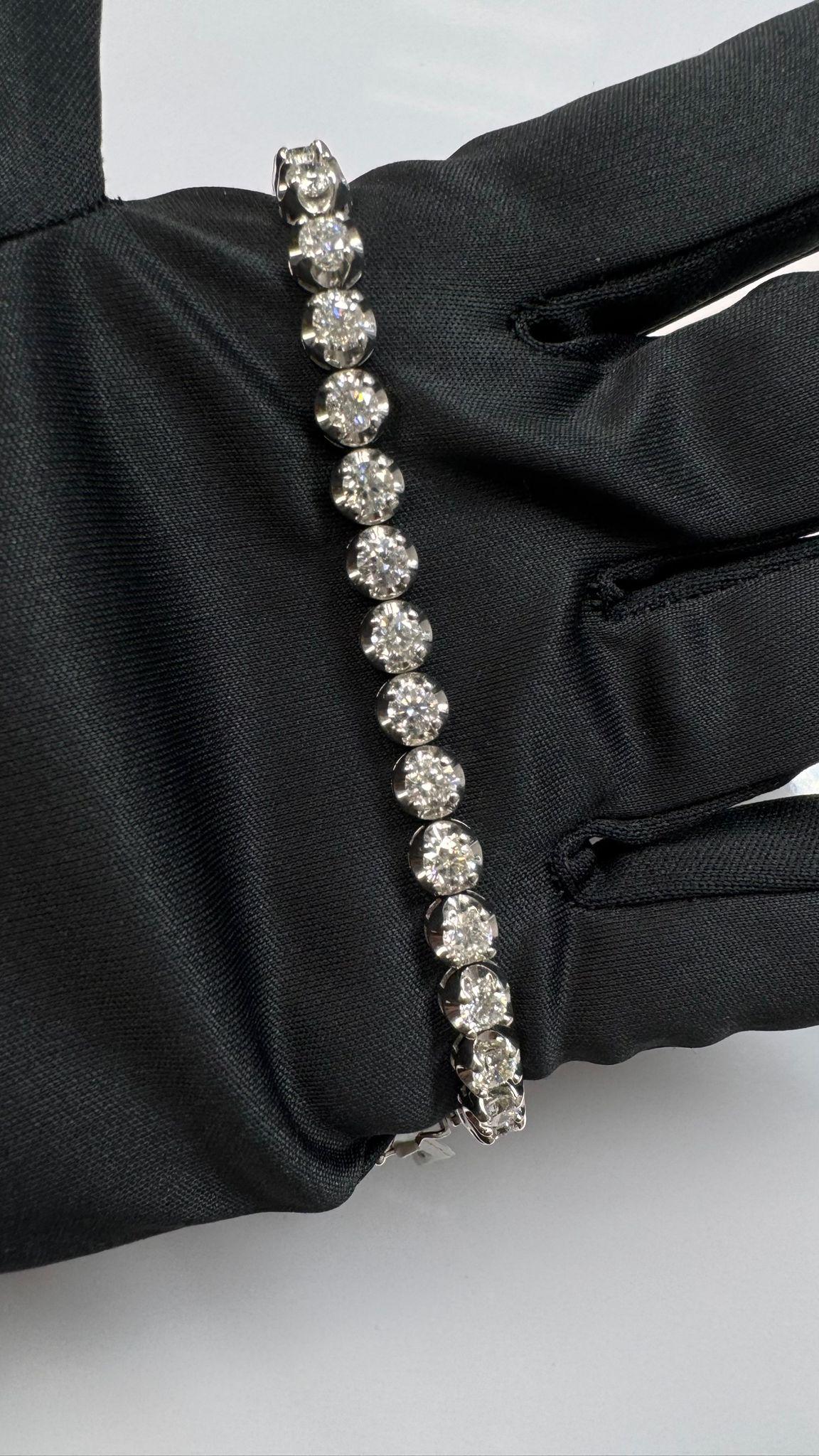 Metal: 14k Gold
Diamond Cut: Round Natural Diamonds
Total Diamond Carats: 7.34 (30 Diamonds, 0.24 Carat average each)
Diamond Clarity: VS
Diamond Color: F
Color: White Gold
Bracelet Length: 7 Inches

Included with your order:
Certificate of
