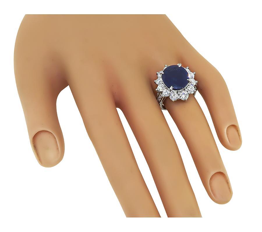 This is an amazing platinum engagement ring. The ring is centered with a lovely oval cut Ceylon sapphire that weighs approximately 7.34ct. The sapphire is accentuated by sparkling round cut diamonds that weigh approximately 2.52ct. The color of the