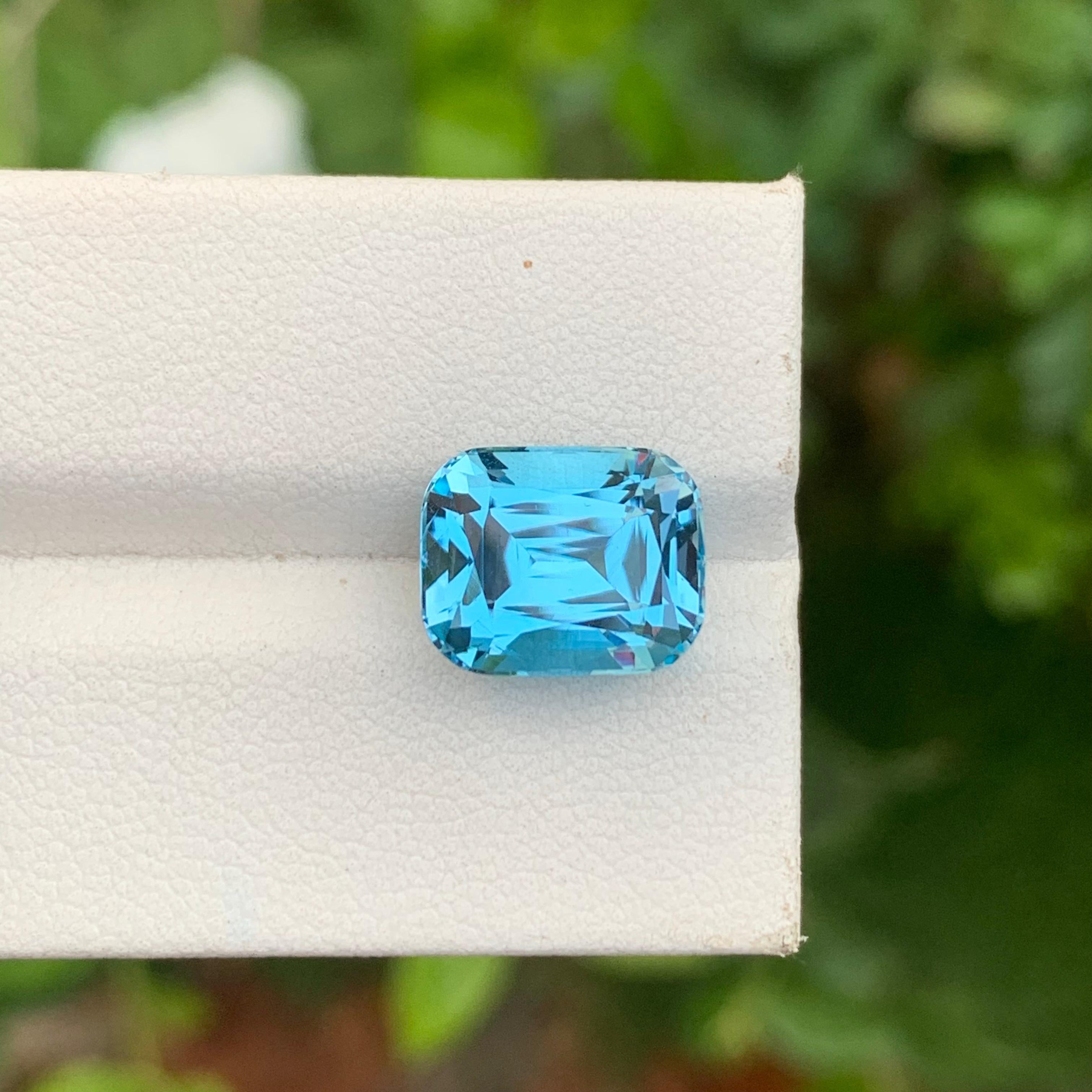 Loose Blue Topaz
Weight: 7.35 Carats
Dimensions: 11.6 x 9.3 x 7.6 Mm
Origin: Brazil
Shape: Cushion
Color: Blue
Certificate: On Demand

Benefits Of Wearing Blue Topaz Stone:
It helps to improve communication and self-expression.
It provides inner