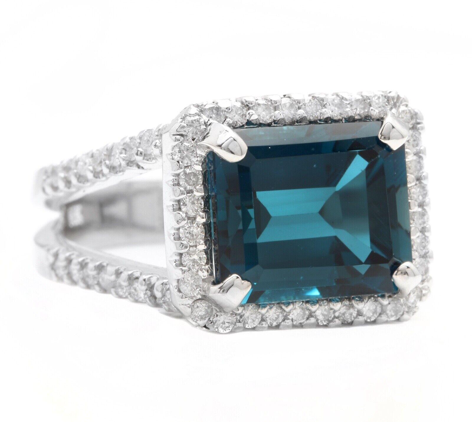 7.35 Carats Impressive Natural London Blue Topaz and Diamond 14K White Gold Ring

Suggested Replacement Value: Approx. $6,000.00

Total Natural London Blue Topaz Weight is: Approx. 6.50 Carats

Topaz Measures: Approx. 12.00 x 10.00mm

Natural Round