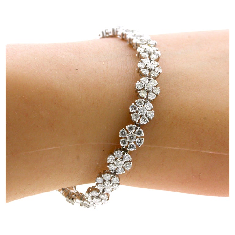 7.36 Carat Diamond Gold Flower Tennis Bracelet For Sale at 1stDibs