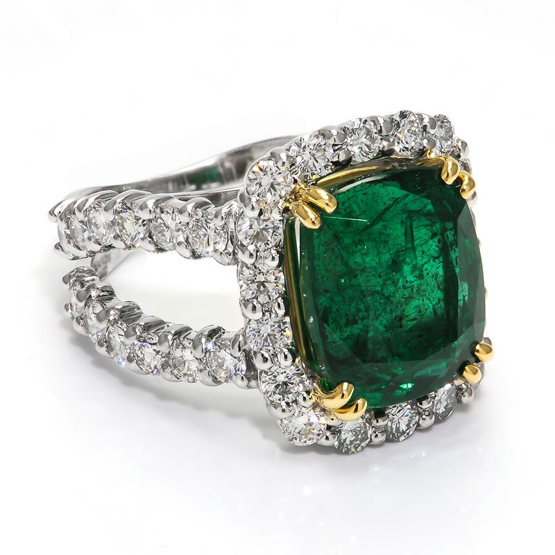 Simply Beautiful! Emerald and Diamond Gold Cocktail Ring. Centering a 7.36 Carat Zambian Emerald, surrounded by 36 Brilliant-cut Diamonds, including on shank, weighing approx. 2.37tcw. Artistically Hand-crafted 18k White and Yellow Gold mounting.