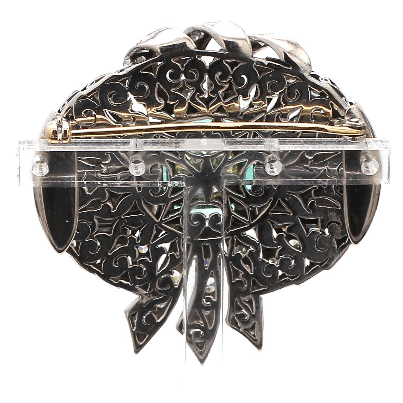 Women's 7.36 Carat Round and Circular Brilliant Diamond 2.50 Carat Emerald Platinum Pin For Sale