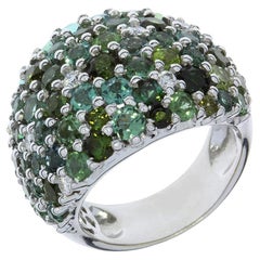 7.36 Carat Total Weight Green Tourmalines 
Diamond 18K Domed Ring
