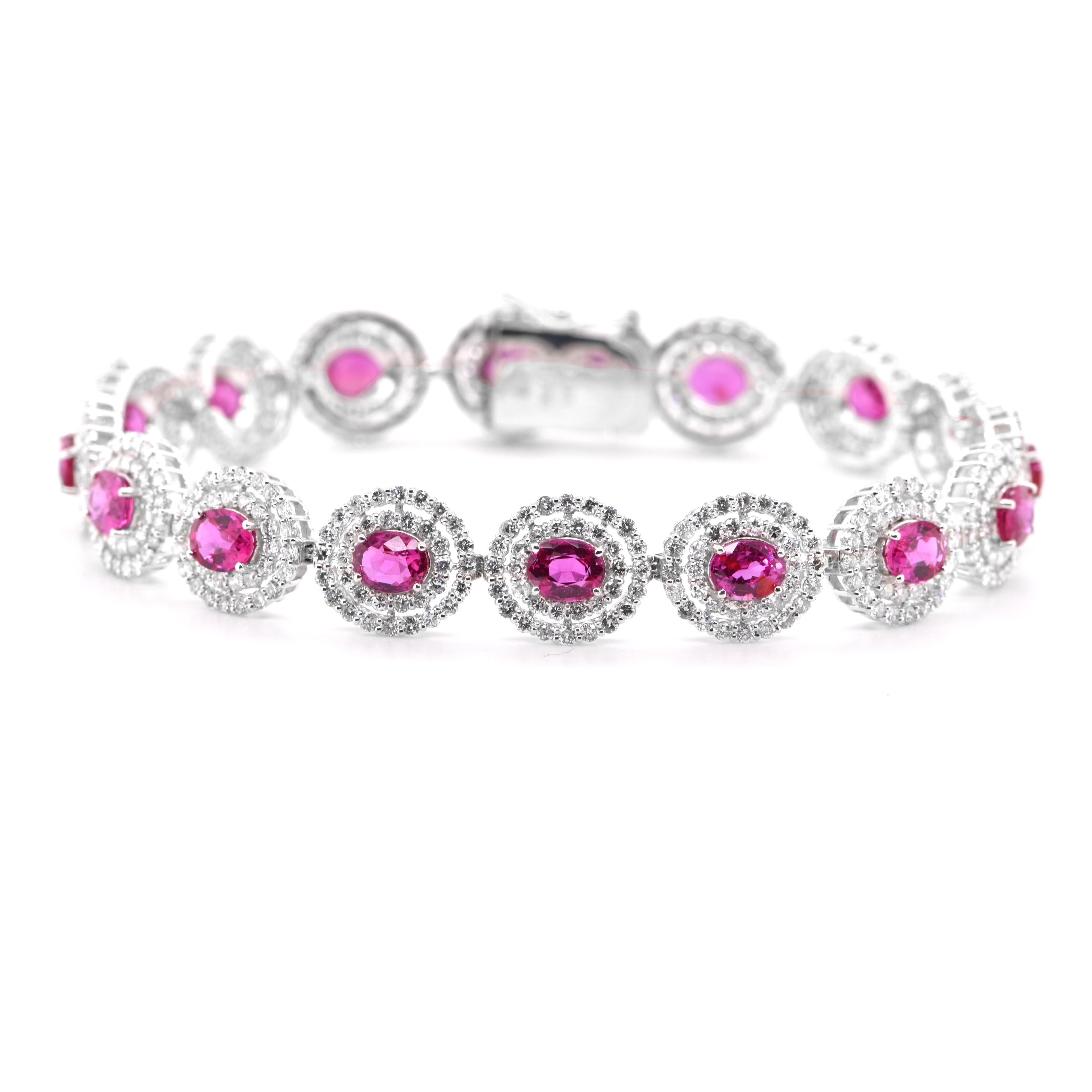 A beautiful Tennis Bracelet featuring a total of 7.36 Carats of Natural Rubies and 4.15 Carats of Diamond Accents set in Platinum. The Rubies are of 6x4 mm size. Rubies are referred to as 