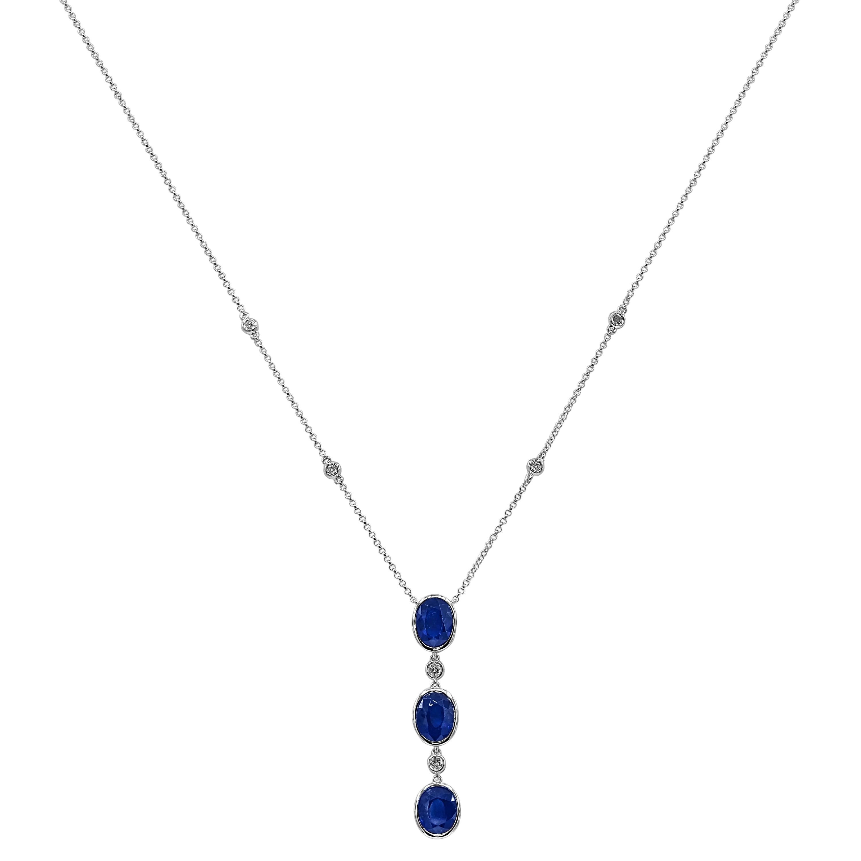 3 Sapphire Gemstones: 7.17 Carats
6 White Diamonds: 0.19 Carats
Metal: 18K White Gold, 5.20 Grams
