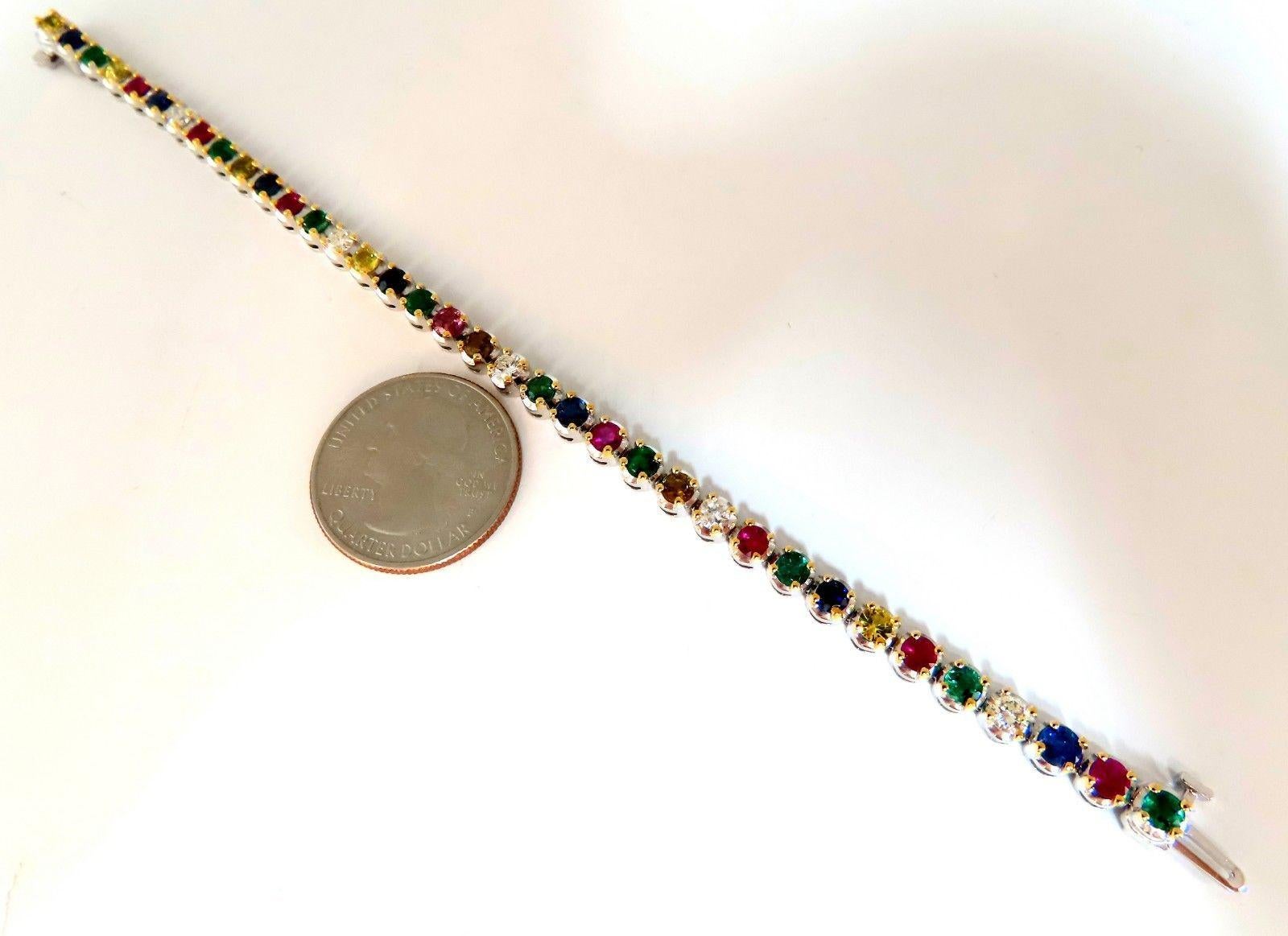 Gem Line.

6.50ct. Natural Sapphires, Ruby, & Emeralds bracelet.

Full round cuts, great sparkle.

Multi-color sapphires.

Vibrant Greens, yellows, Blues & Reds

Clean Clarity & Transparent.

5 Round Diamonds: .86ct

H-color Vs-2 clarity

Secure