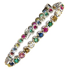 Pulsera tipo «tennis» con rubíes naturales, esmeraldas, zafiros y diamantes de 7,36 ct, línea de gemas de 14 quilates*