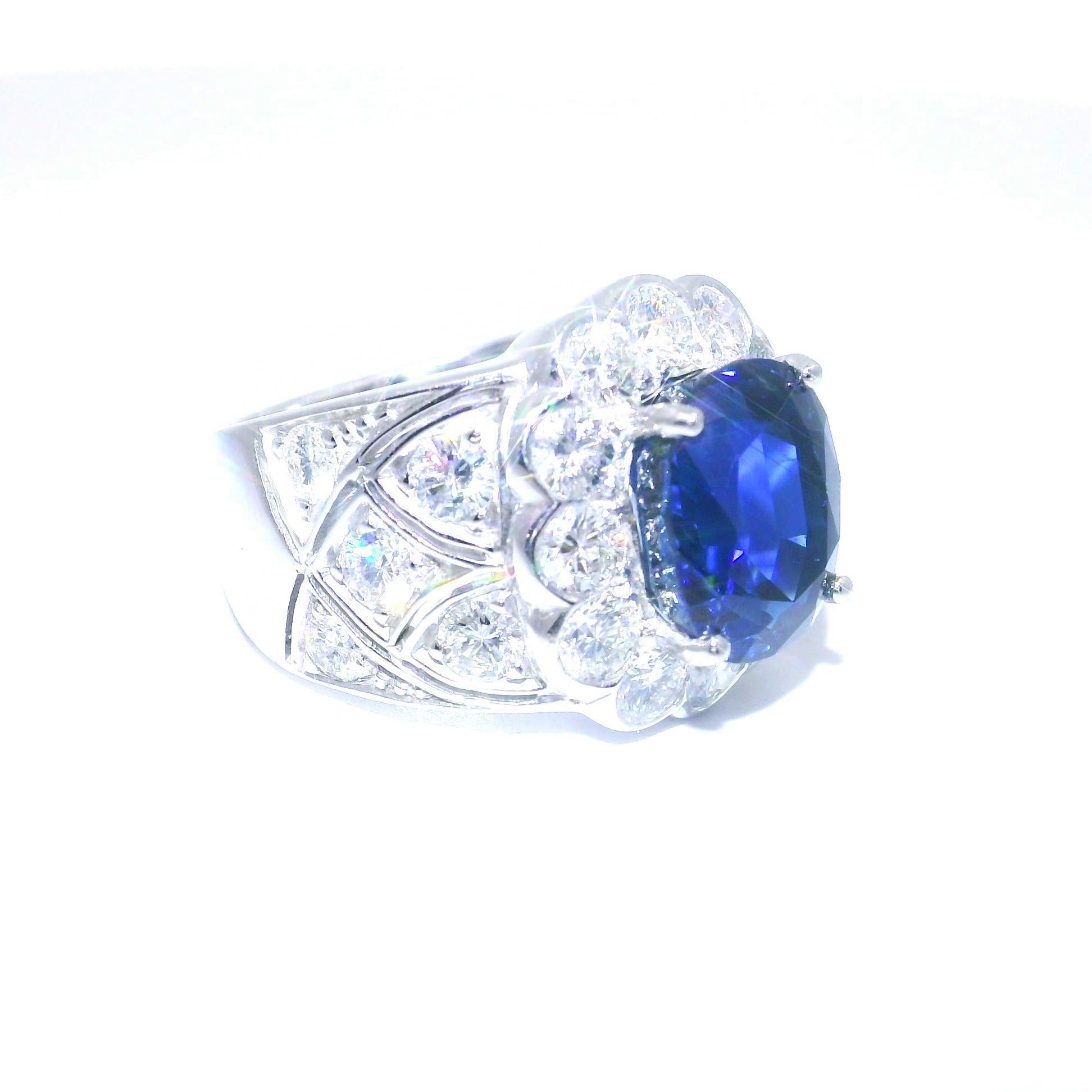 A rare and top-quality gem blue sapphire takes center stage. It weighs an impressive 7.37 carats and exudes a rich intense royal blue color that is also completely natural. The sapphire is certified by the Gübelin gem lab in Switzerland as natural,