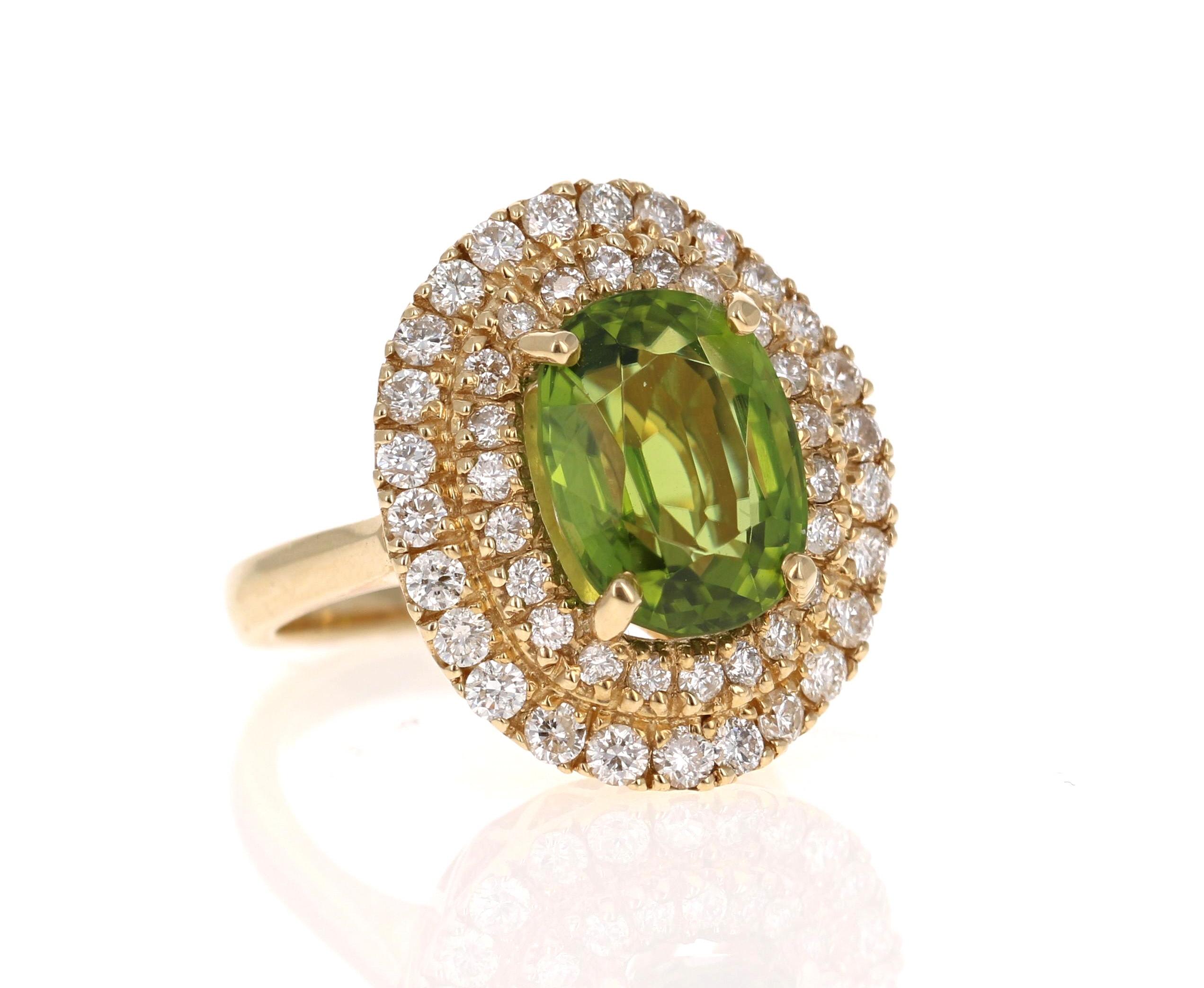 Oval Cut 7.37 Carat Peridot Diamond 14 Karat Yellow Gold Cocktail Ring For Sale