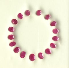 73.76 Carats Ruby Mozambique Oval Faceted Cut stone Layout Heated Natural Gem