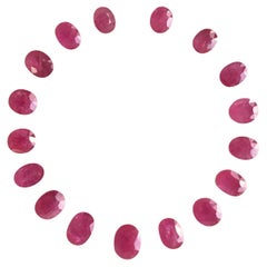 73.76 Carats Ruby Mozambique Oval Faceted Cut stone Layout Heated Natural Gem