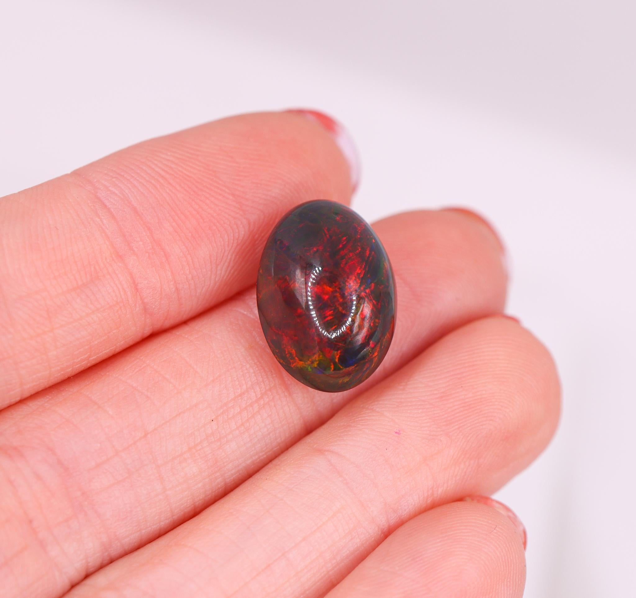 7.38 Carat Black Opal Loose Gemstone Oval 16x12mm For Sale 1