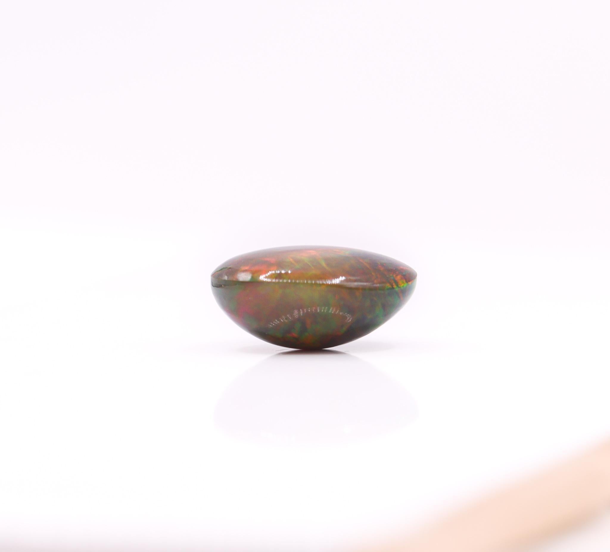 7.38 Carat Black Opal Loose Gemstone Oval 16x12mm For Sale 3