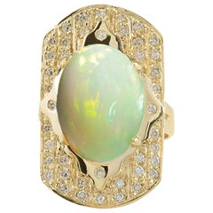 Ring aus 14 Karat Gelbgold mit natürlichem Opal und Diamant