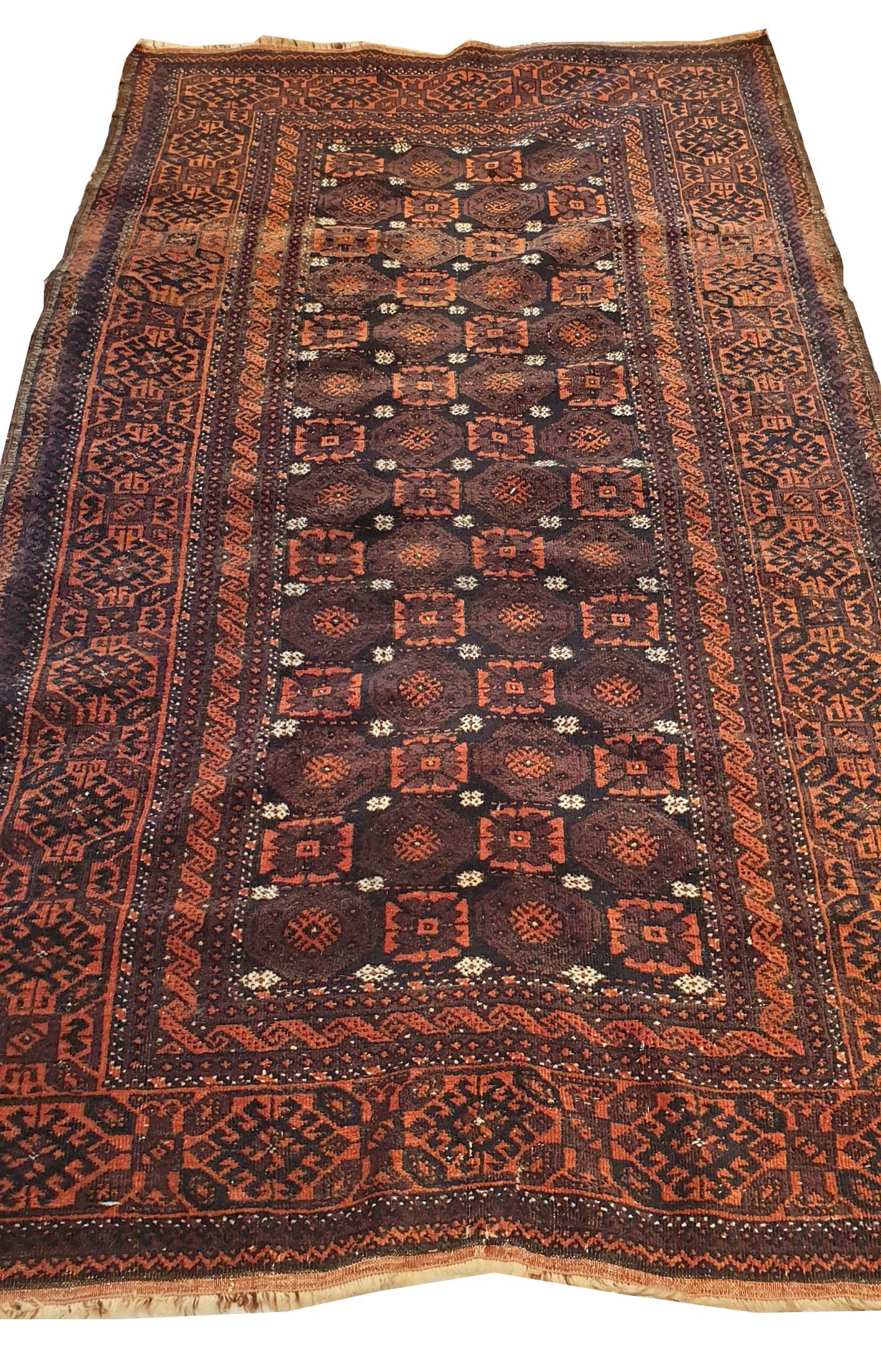 738 - beautiful Turkmen Bukhara carpet from the 20th century very decorative with a nice geometric design with Bukhara Guls and a red field with blue, finely knotted by hand with woolen velvet on a wool background.
