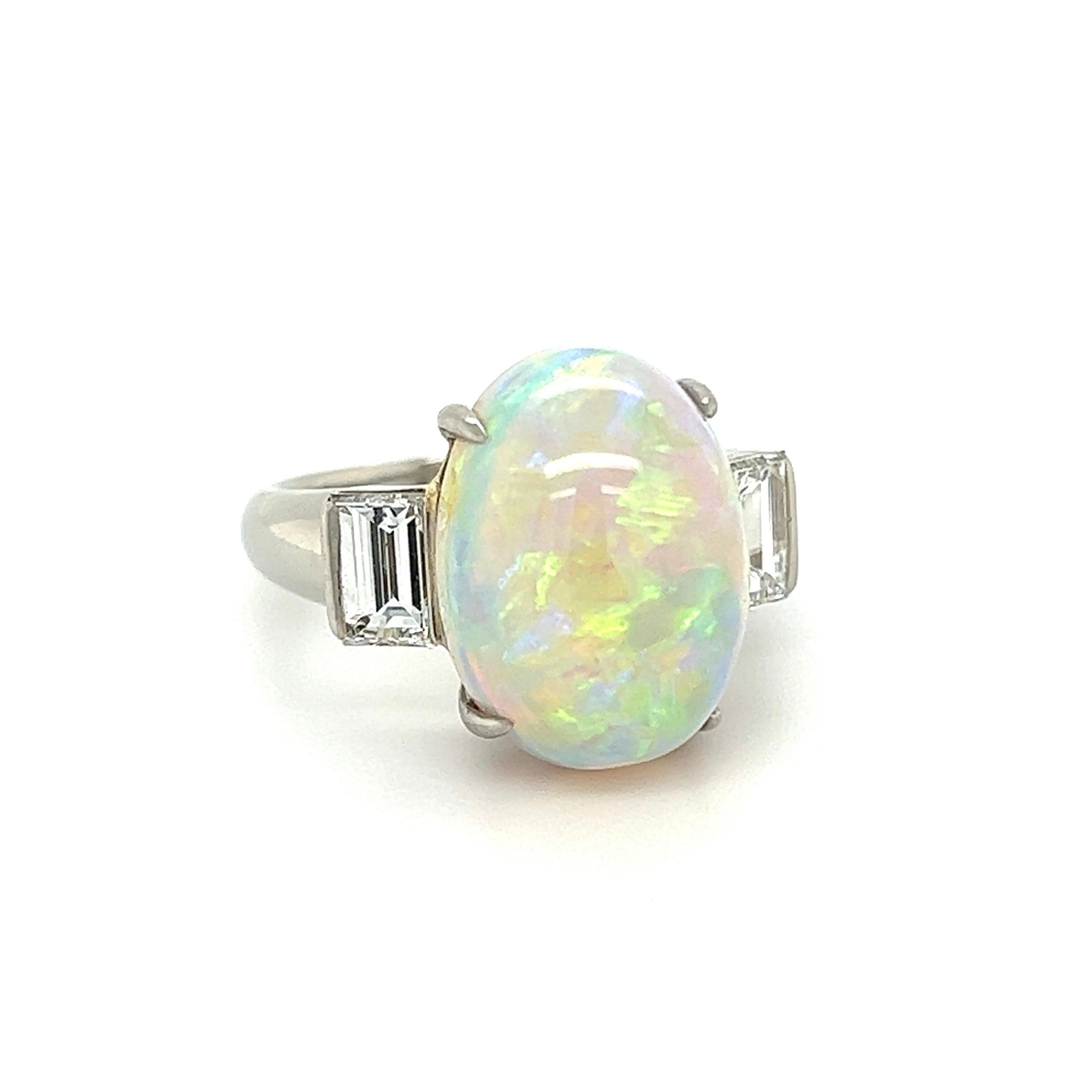 Simply Beautiful and finely detailed Andamooka Opal and Diamond Platinum Cocktail Ring. Centering a securely nestled Hand set Australian Andamooka White Opal, weighing 7.39 Carats, either side set with Diamonds, approx. 1.13 total carat weight. Hand