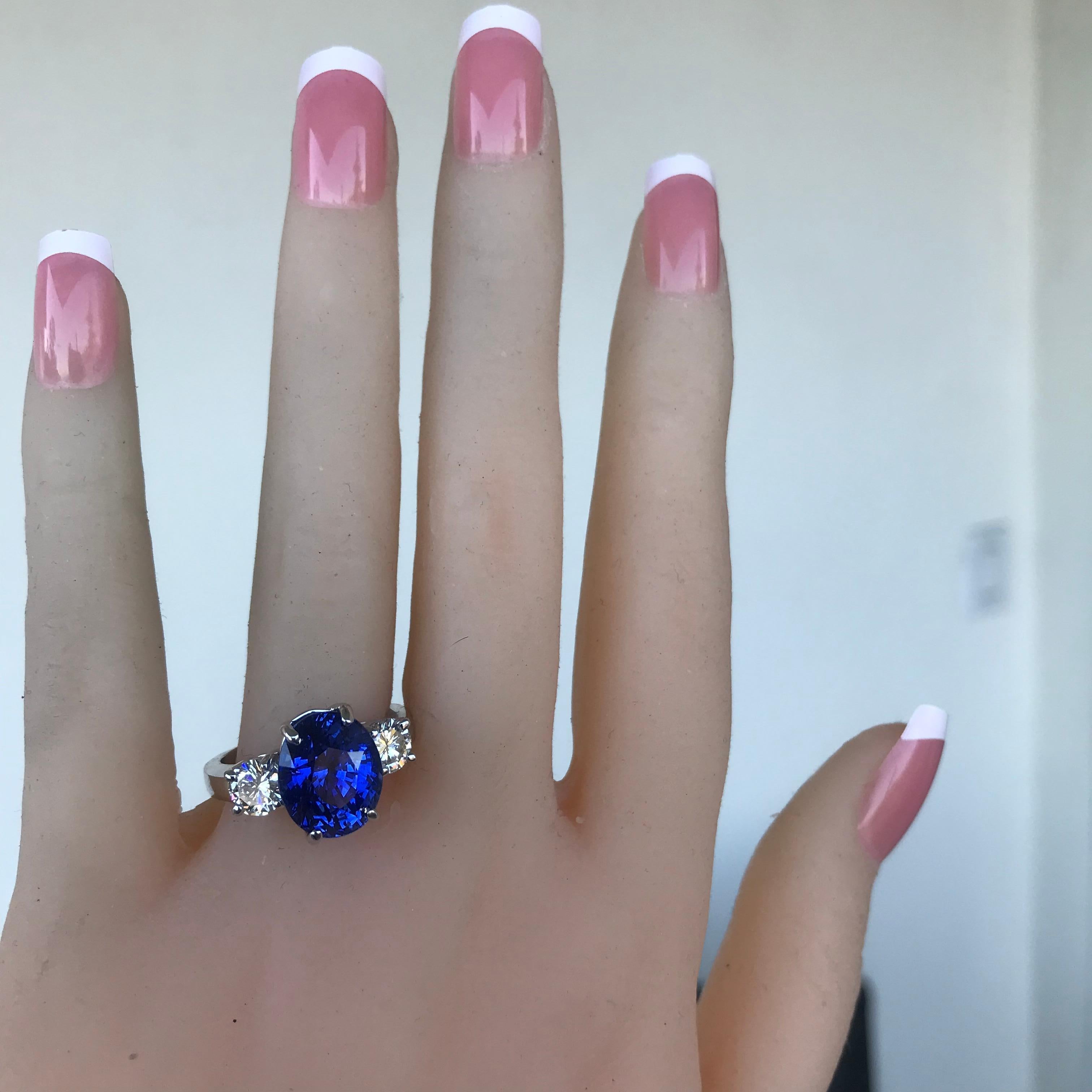 B464005

7.39 Carat Blue Sapphire 3 Stone Diamond Ring.

1. Carat Weight: 7.39 Carat Sapphire

2. Color: Intense Royal Blue

3. Tone:  Medium - 7.5 Out of 10, any higher will be over dark and any lower will be too light.

4. Hue: Vivid Medium