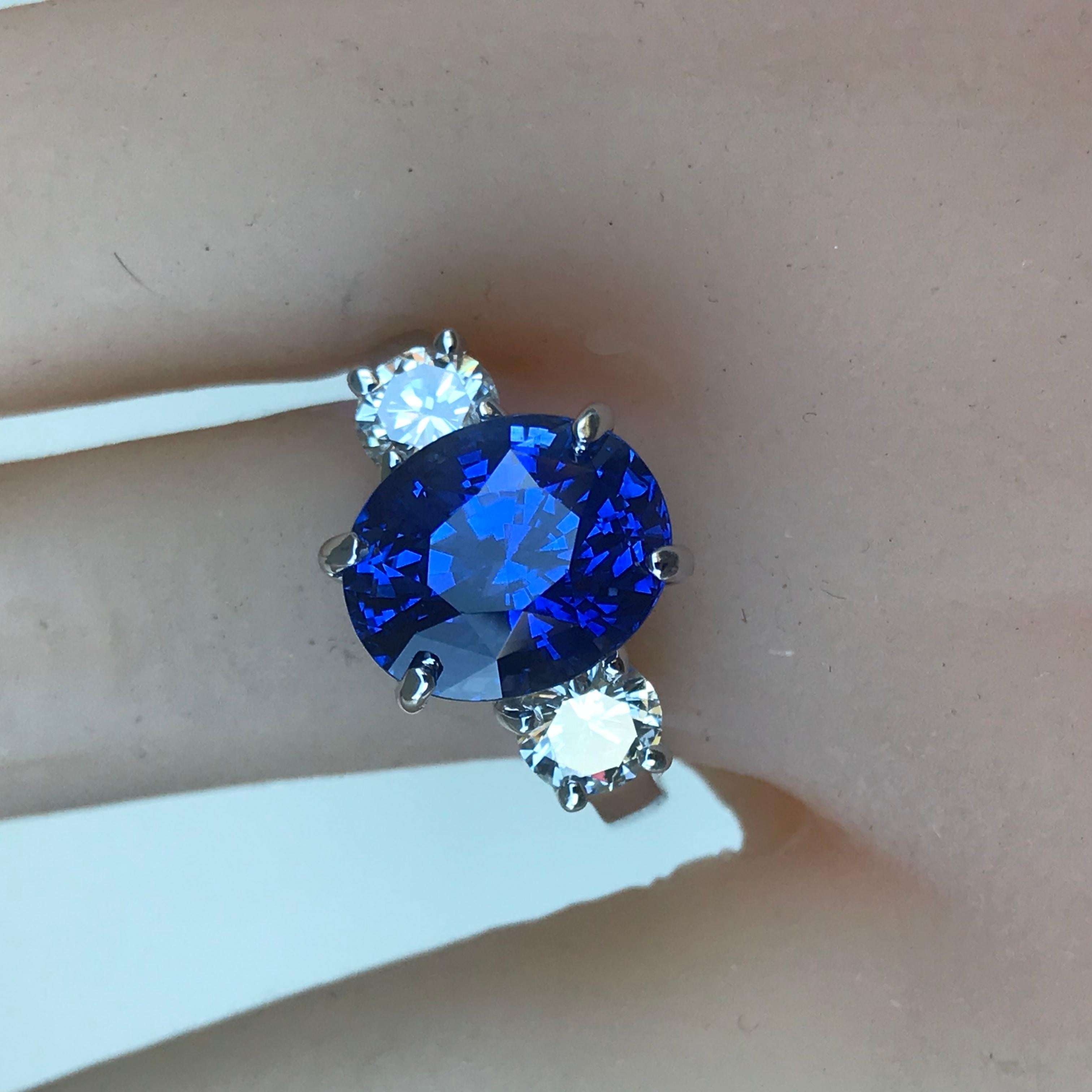 Contemporary 7.39 Carat Blue Sapphire 3-Stone Diamond Ring For Sale