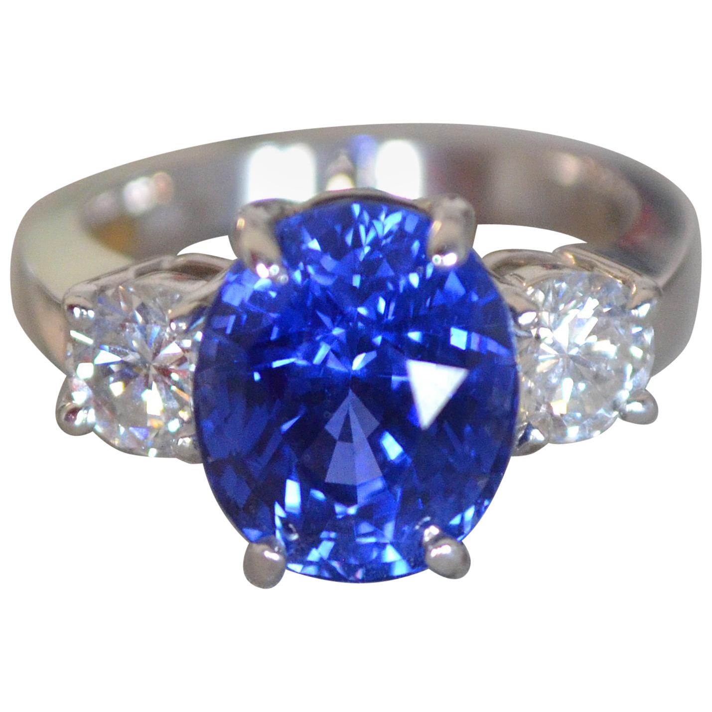 7.39 Carat Blue Sapphire 3-Stone Diamond Ring For Sale