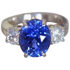 7.39 Carat Blue Sapphire 3-Stone Diamond Ring