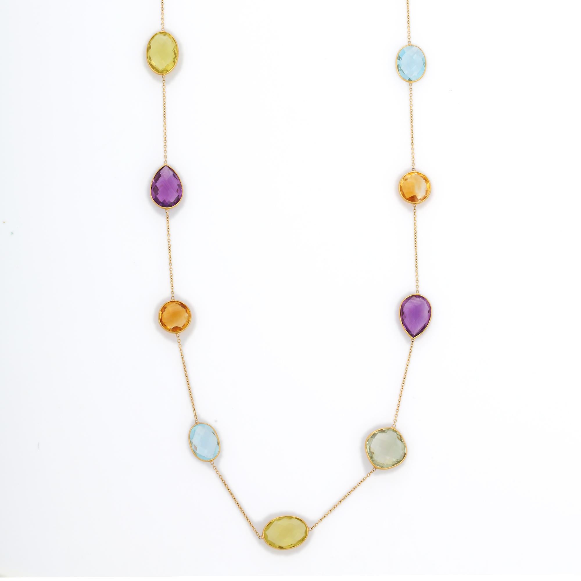 Collana a catena con gemme semipreziose multiple in oro 18 carati, tempestata di gemme multiple a taglio misto.
Accessoriate il vostro look con questa elegante collana a catena con semi-multi gemme. Questo splendido gioiello eleva immediatamente un