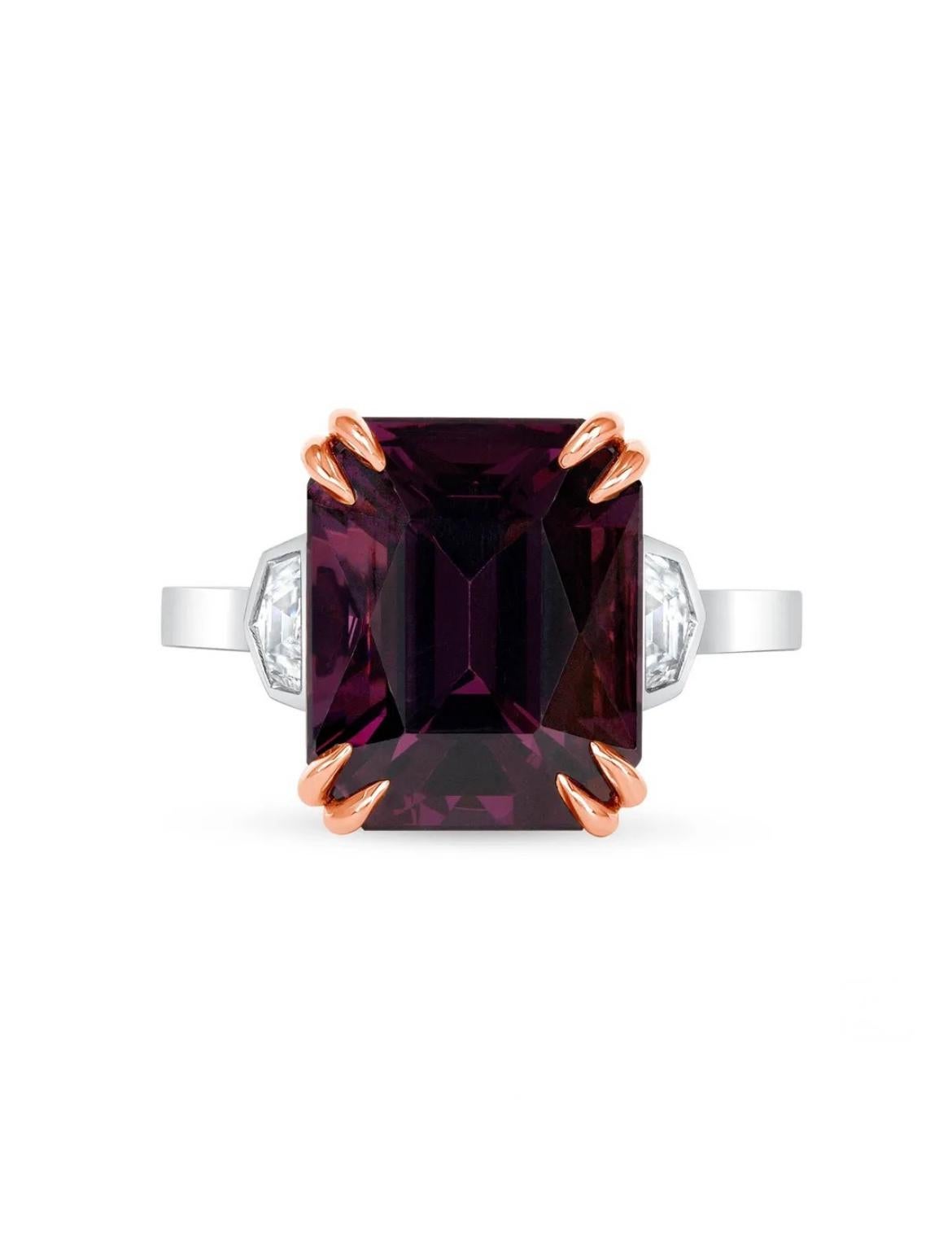 7.39-carat untreated purple Spinel, flanked by two cadillac-cut diamonds. Fabricated in 18K white with rose gold. Spinel is GIA certified. 

Spinel is generally highly sought after by gem connoisseurs, and well-formed spinel crystals are in high