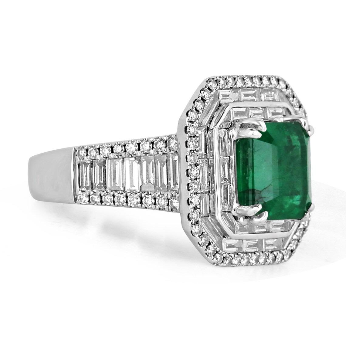 A luxurious emerald and diamond statement ring. This remarkable masterpiece features a large, fine-quality natural Asscher cut emerald from the origin of Zambia. The gemstone showcases a rich dark emerald-green color, excellent-very good clarity,