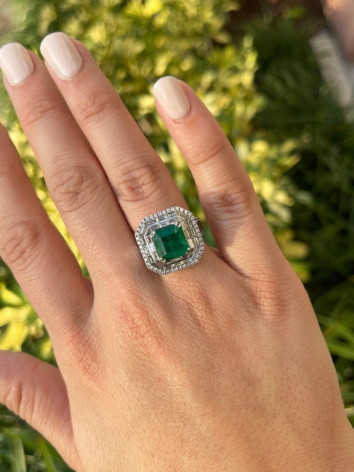 7.39tcw 18K White Gold Emerald & Triple Diamond Halo Statement Engagement Ring In New Condition For Sale In Jupiter, FL