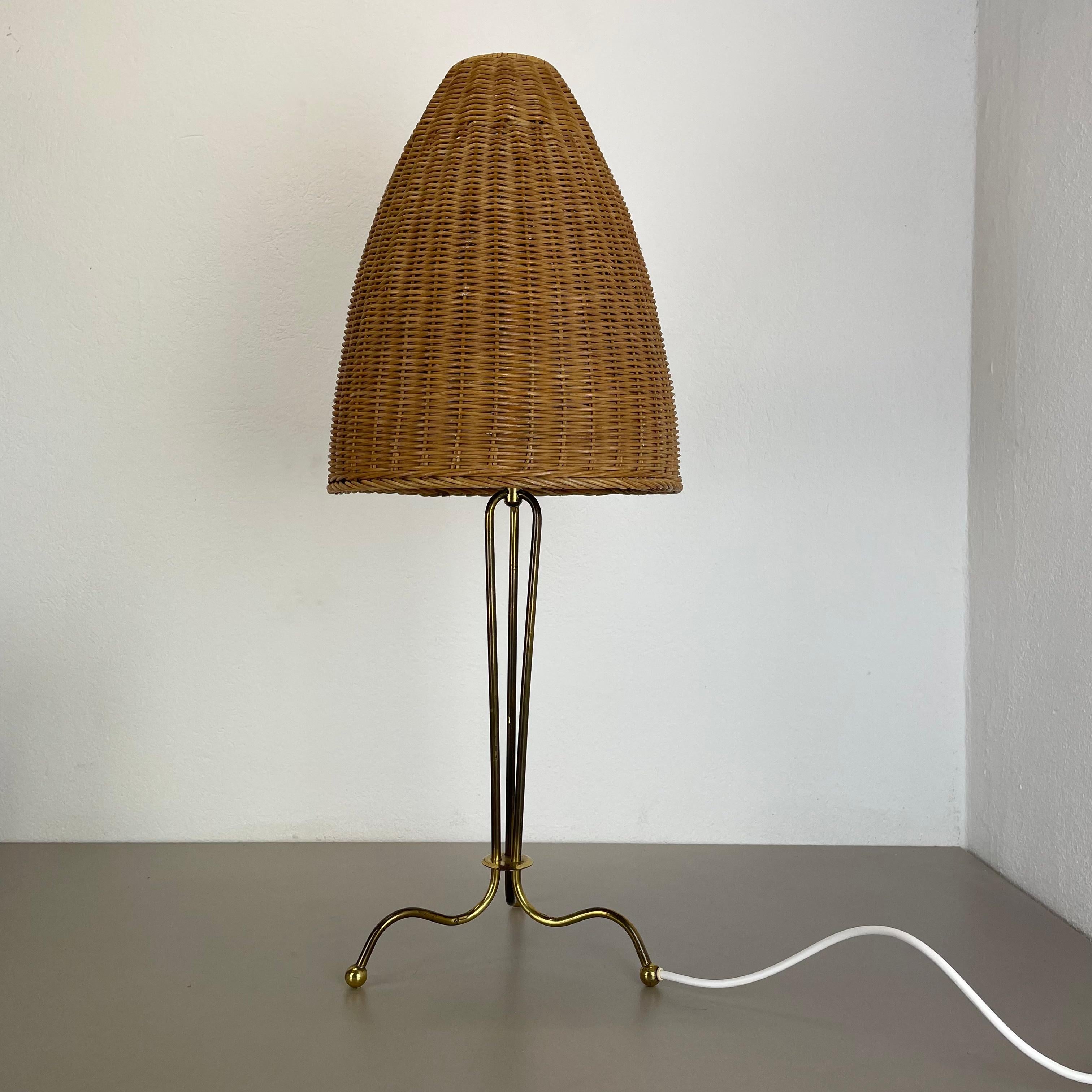 Article:

table light


Origin:

Austria


Age:

1960s


This original vintage table light was designed and produced in the 1960s in Austria. the super rare and minimalist stand element is made of brass combined with 3 upright standing metal parts.