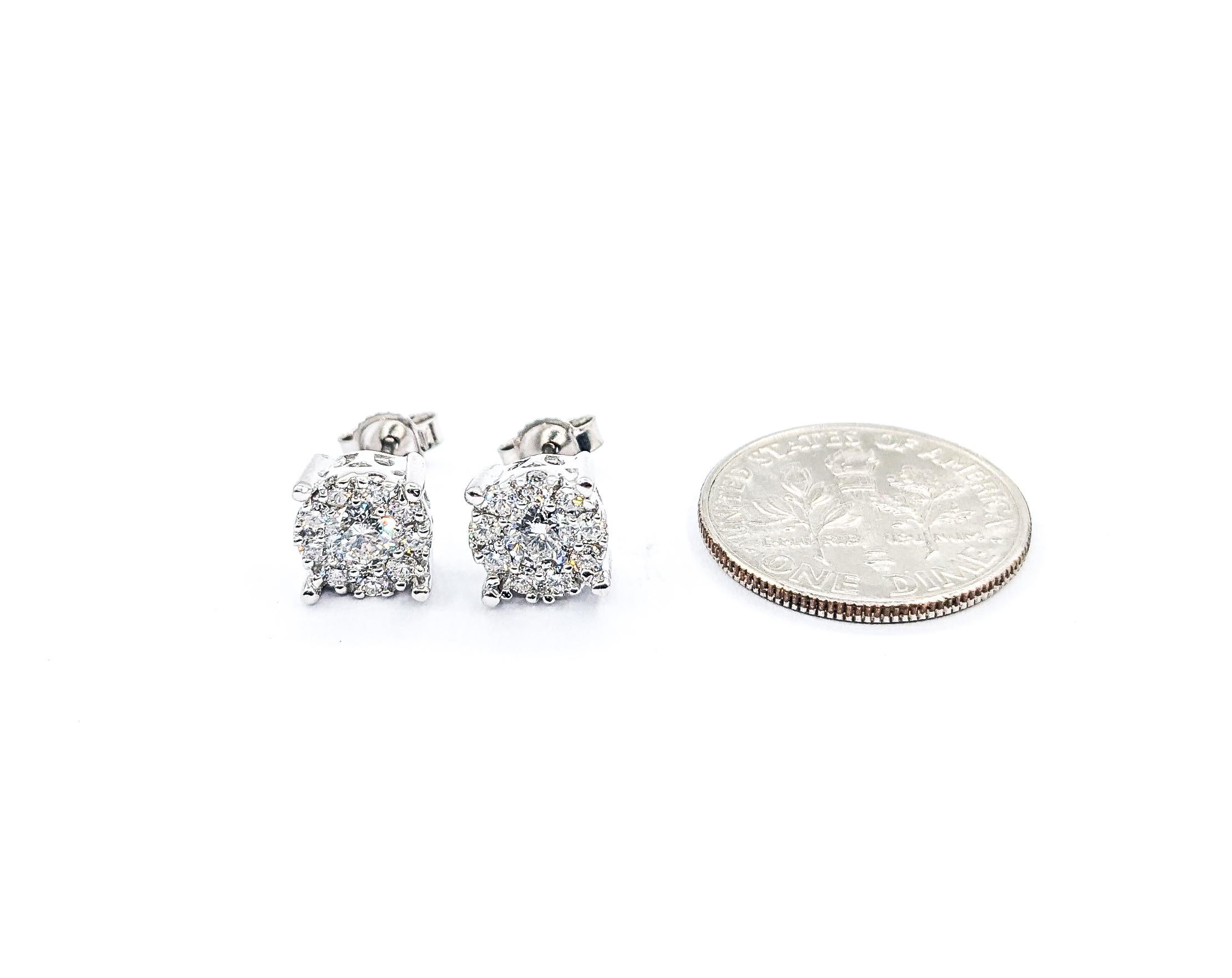 .73ctw Diamond Cluster Stud Earrings In White Gold

Introducing these stunning natural diamond cluster stud Earrings, meticulously crafted in 14k White Gold. These cocktail stud earrings are adorned with .73ctw of diamonds that boast SI clarity and