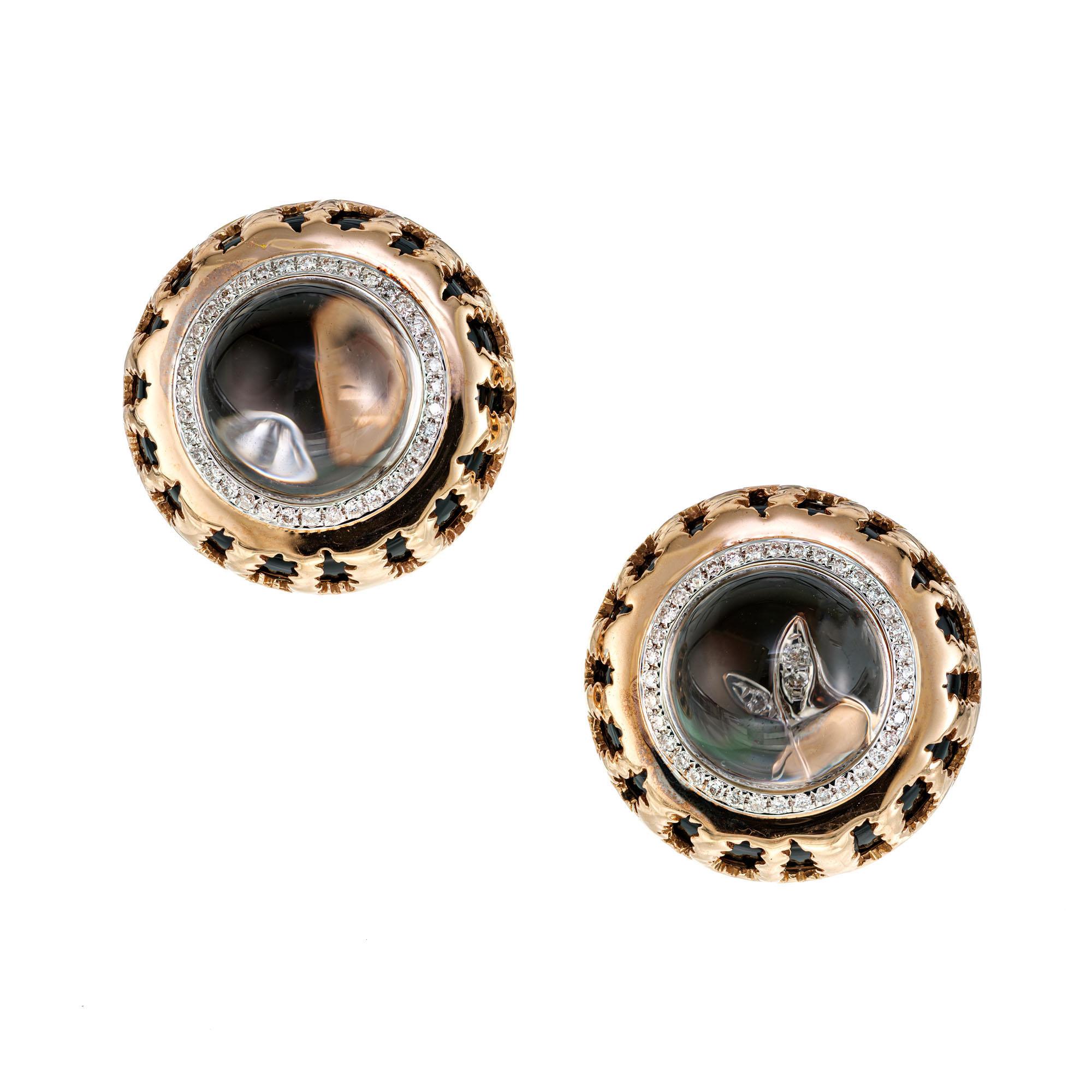 Quartz crystal cabochon earrings in 14k rose gold with a white gold diamond halo and cut out base with a black Onyx interior. Clip and post style. 

2 round crystal clear cabochon Quartz, 10.5mm VS
72 round full cut diamonds, approx. total weight
