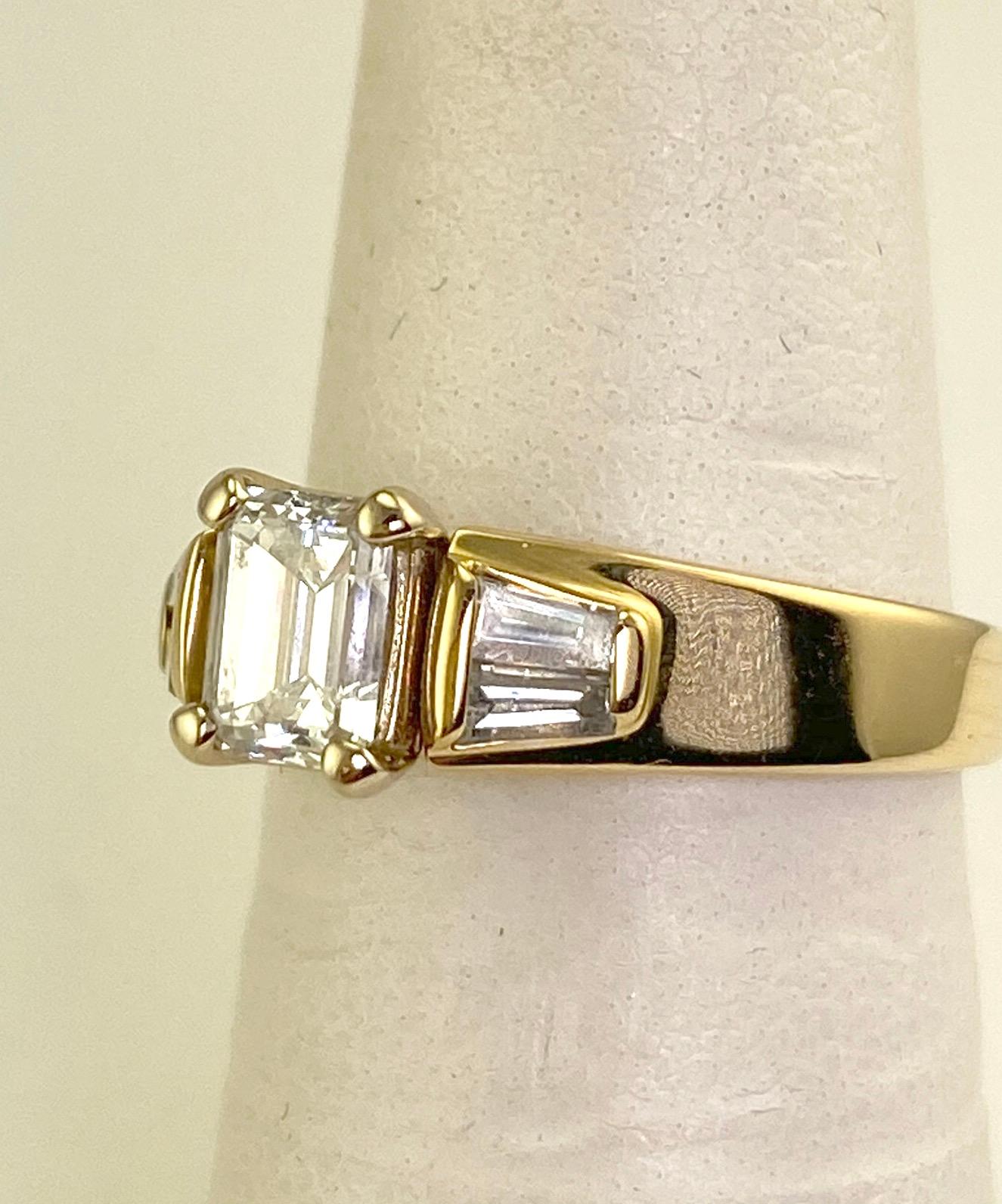 .74 Carat Natural Emerald Cut Diamond Ring w/ Baguette Diamonds 1.0 CTW. 14K Y/G In Excellent Condition For Sale In Daytona Beach, FL