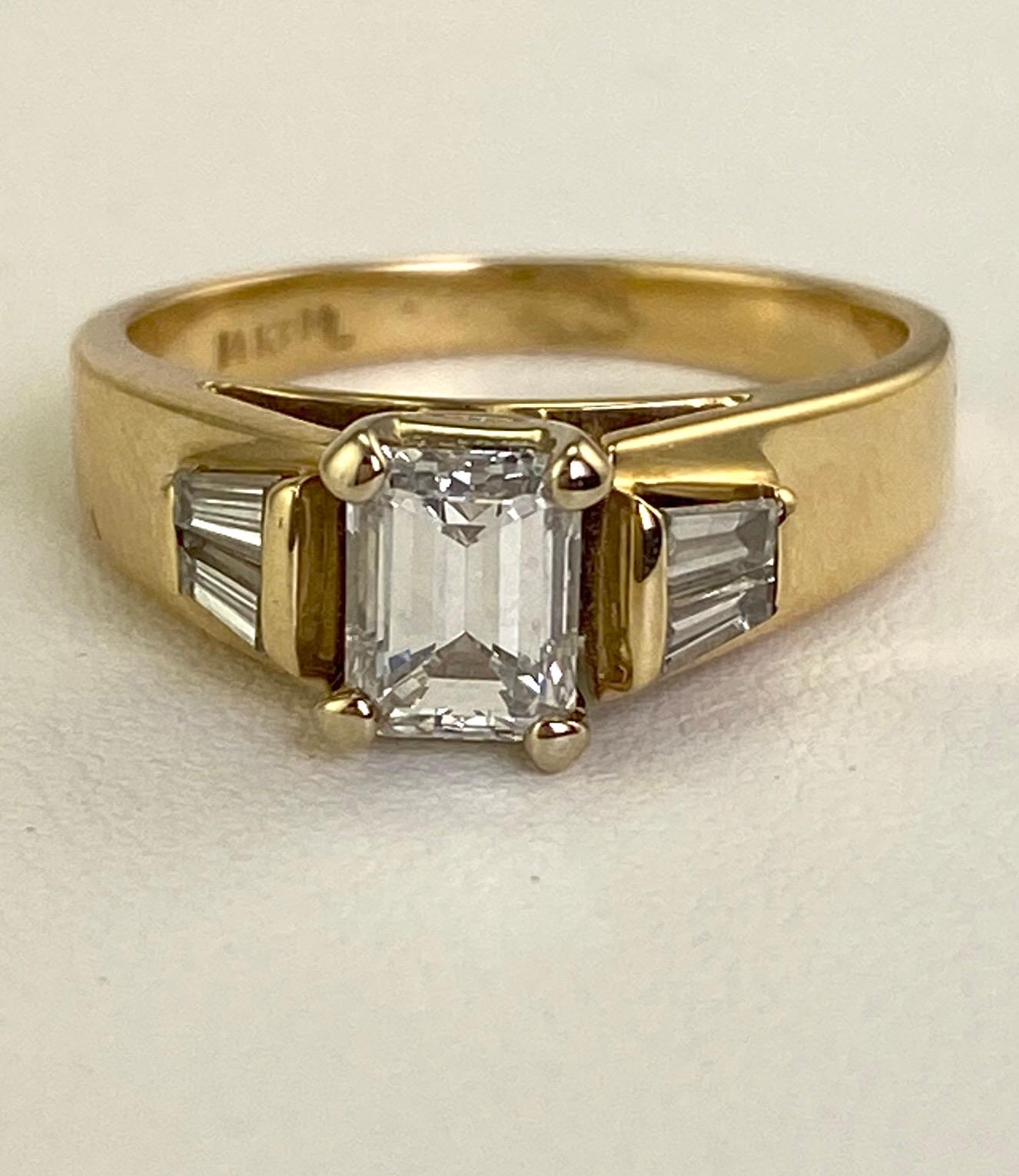 Women's or Men's .74 Carat Natural Emerald Cut Diamond Ring w/ Baguette Diamonds 1.0 CTW. 14K Y/G For Sale
