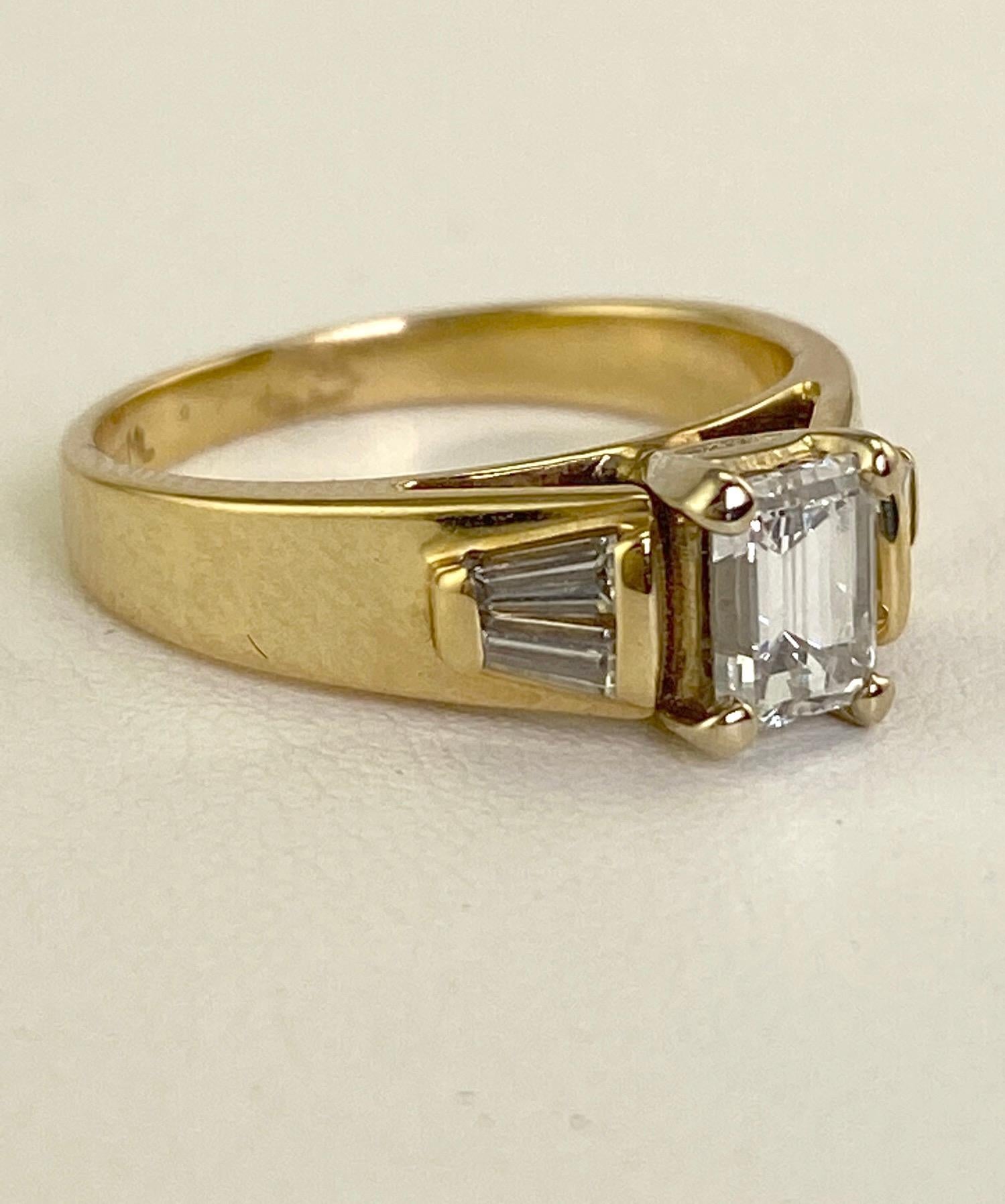 .74 Carat Natural Emerald Cut Diamond Ring w/ Baguette Diamonds 1.0 CTW. 14K Y/G For Sale 1