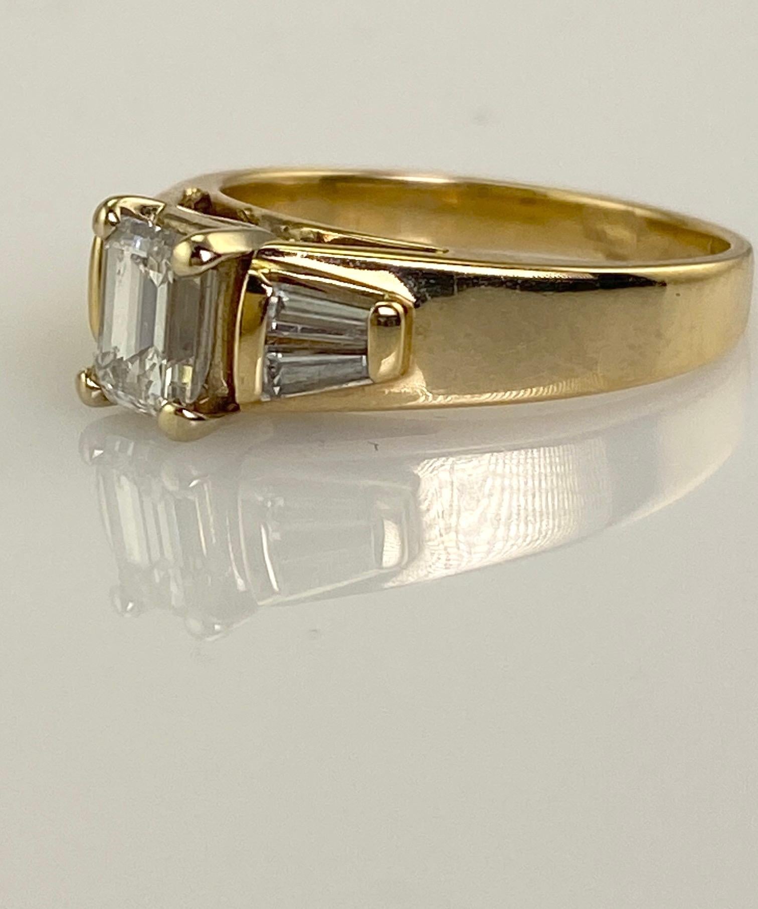 .74 Carat Natural Emerald Cut Diamond Ring w/ Baguette Diamonds 1.0 CTW. 14K Y/G For Sale 2