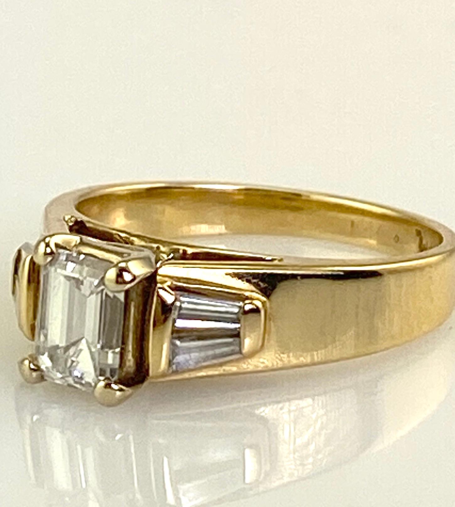 .74 Carat Natural Emerald Cut Diamond Ring w/ Baguette Diamonds 1.0 CTW. 14K Y/G For Sale 4