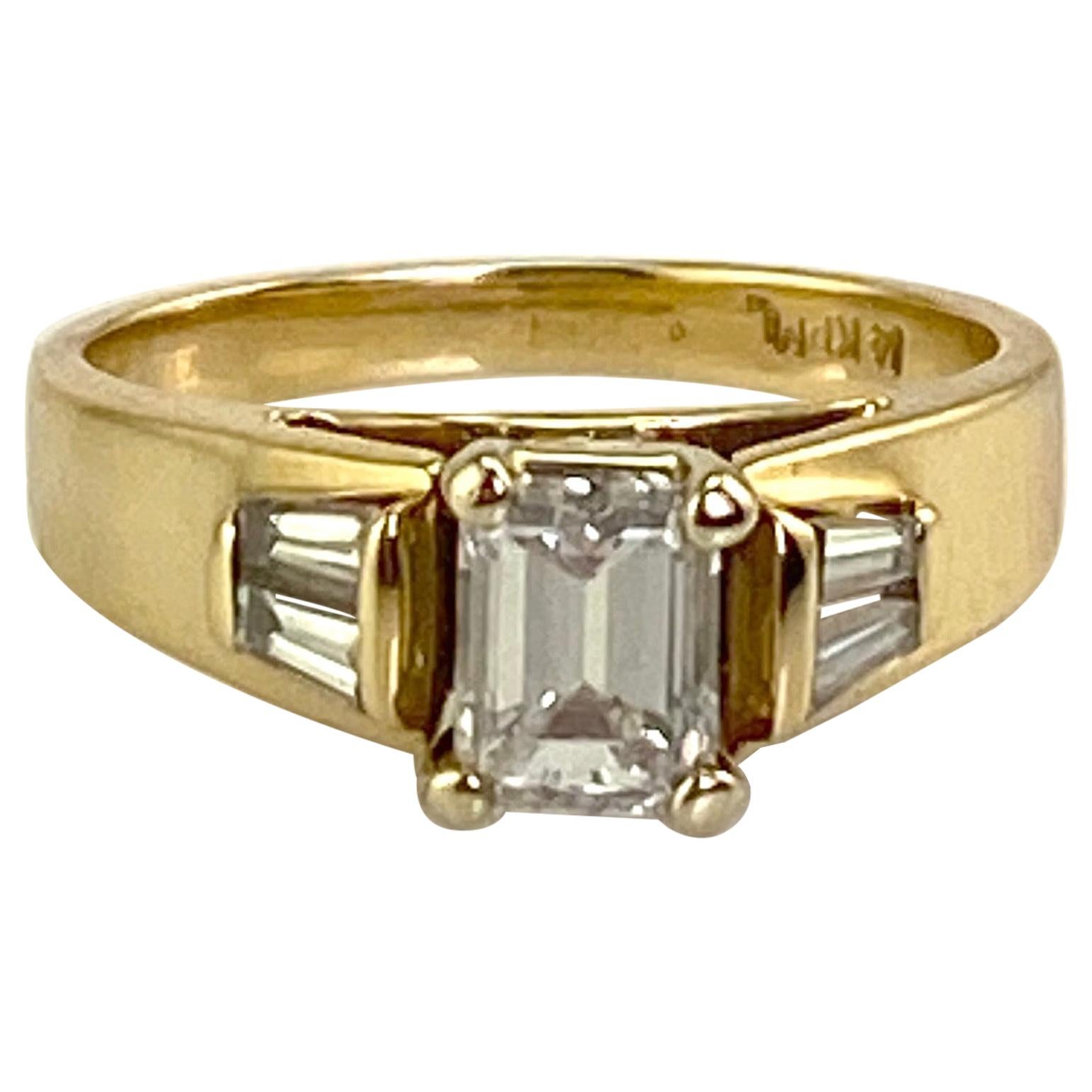 .74 Carat Natural Emerald Cut Diamond Ring w/ Baguette Diamonds 1.0 CTW. 14K Y/G For Sale
