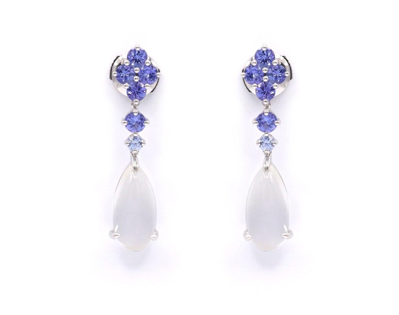 Elegant all time fashion 7.4 Carat Pear Moonstone Tanzanite 18 Karat White Gold Earrings

12 Tanzanites - 1.34 ct
2 Moonstones - 6.06 ct

 According to Hindu mythology, moonstone is made of solidified moonbeams. Many other cultures also associate
