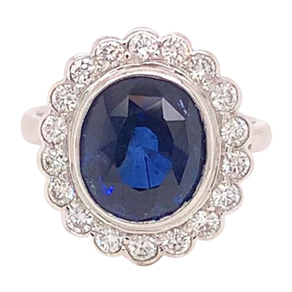 7.4 Carat Semi-Oval Blue Sapphire and Diamond Cluster Ring in 18k White Gold For Sale