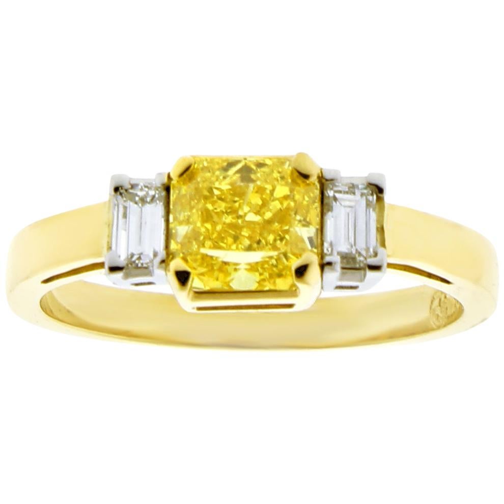 .74 Carat Vivid Yellow Internally Flawless Diamond Three-Stone Ring For Sale