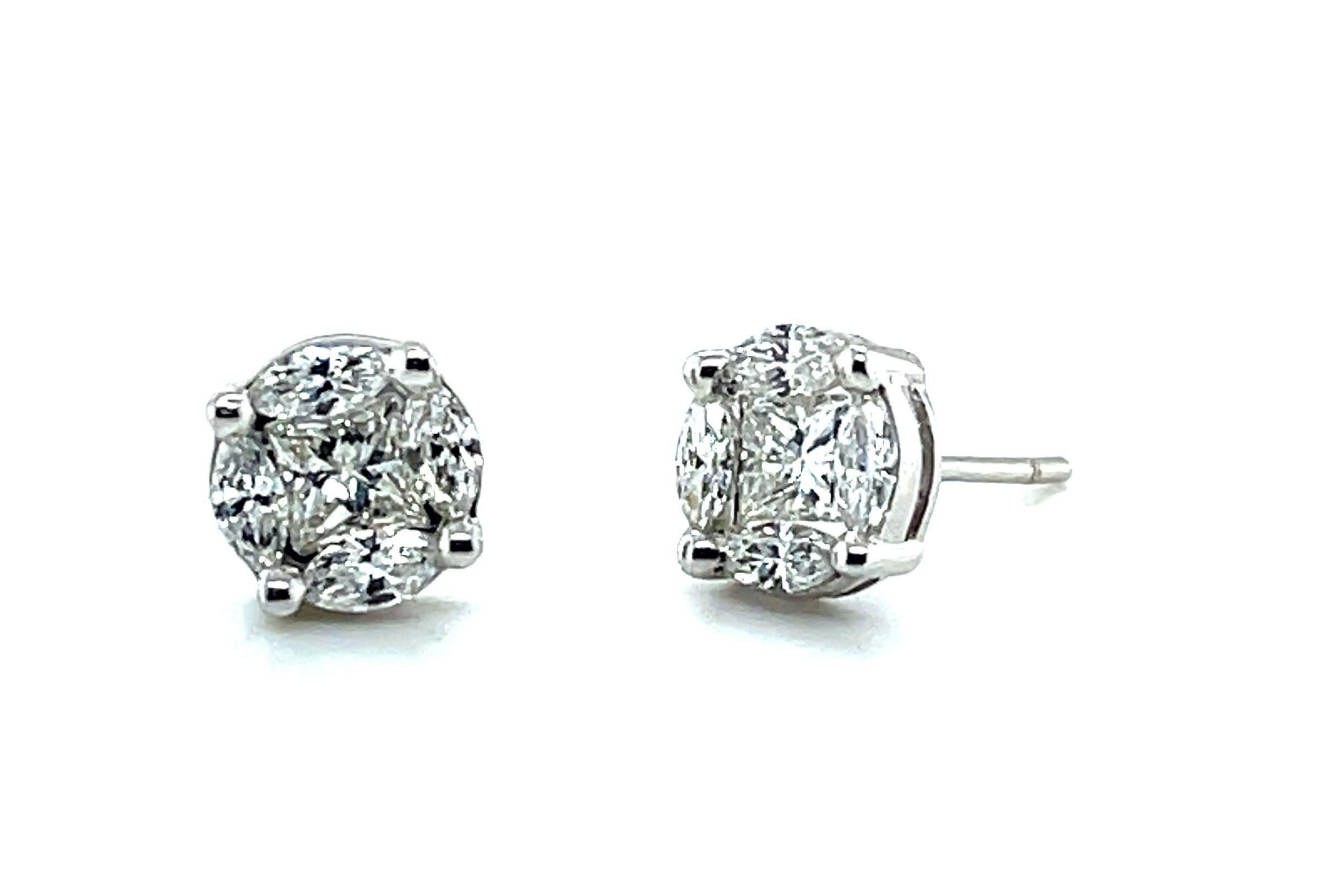 Each of these diamond stud earrings looks as though it is made of a single diamond when worn. It is a beautiful illusion! (Take a look at the size and scale on our model in the photographs of these earrings.) In fact, each earring is comprised of a